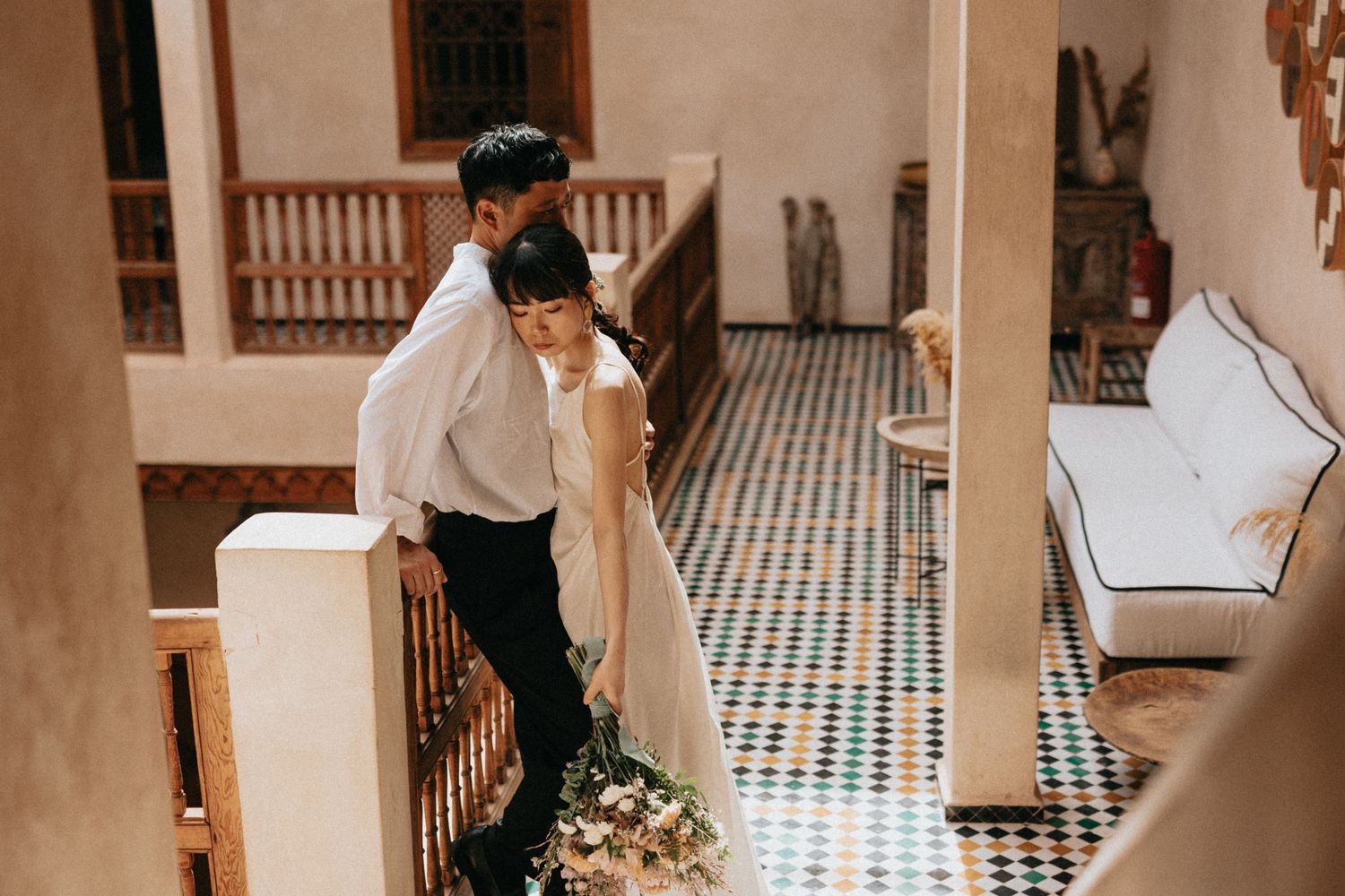 Romantic couple portrait in a Marrakech riad courtyard