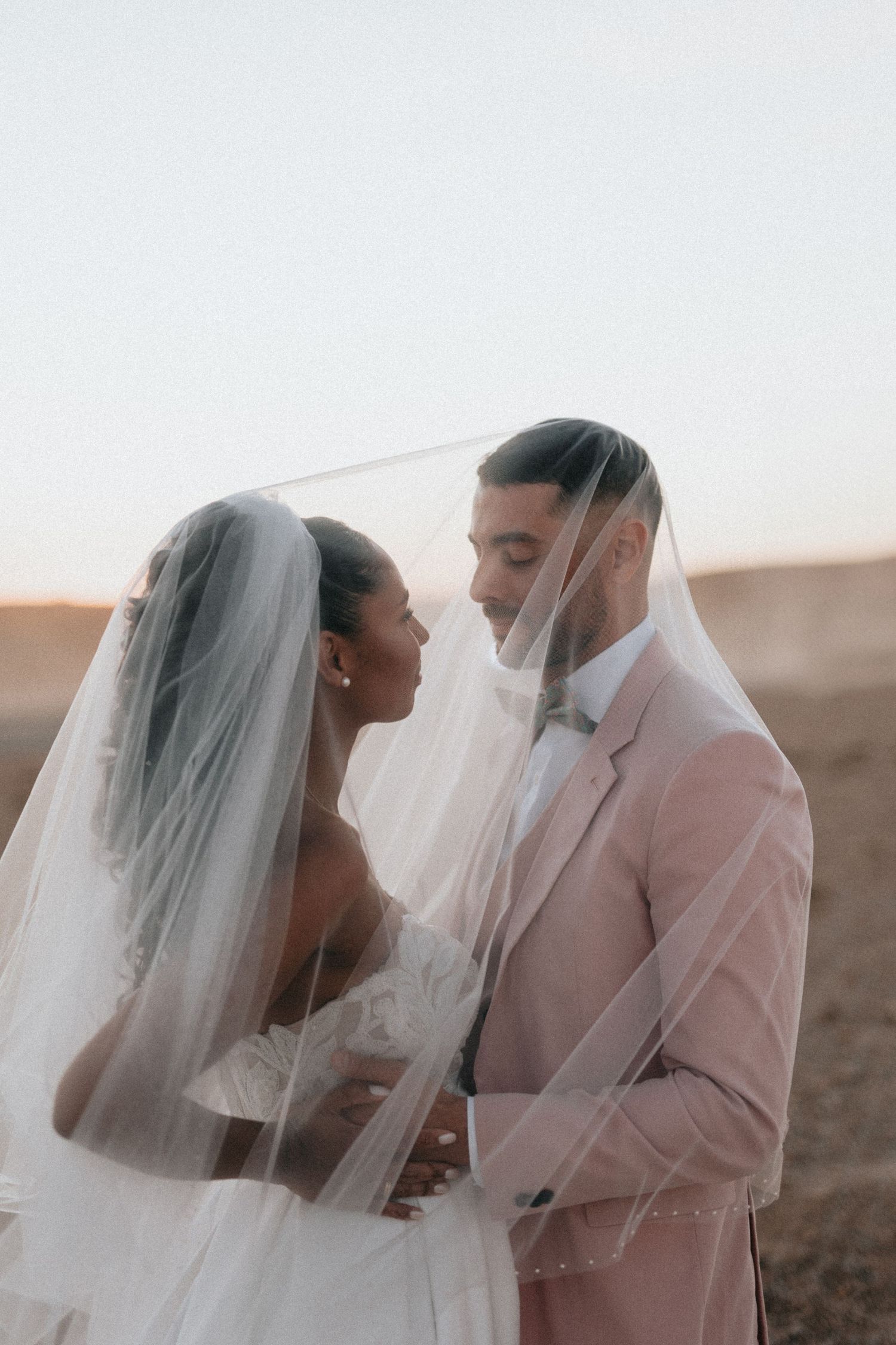 wedding  in the desert of agafay marrakech, editorial bride and groom photoshoot in agafay desert. marrakech wedding photographer