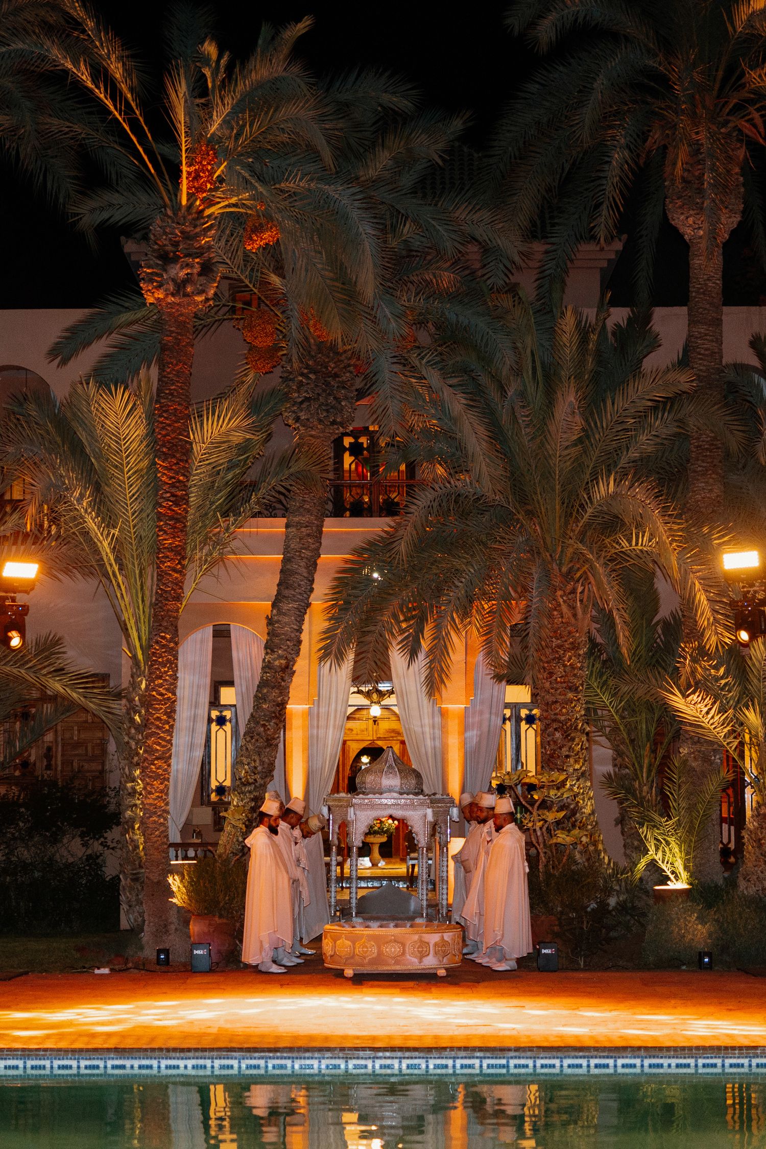 amaria ceremony, bride and groom in traditional caftans carried by 4 men