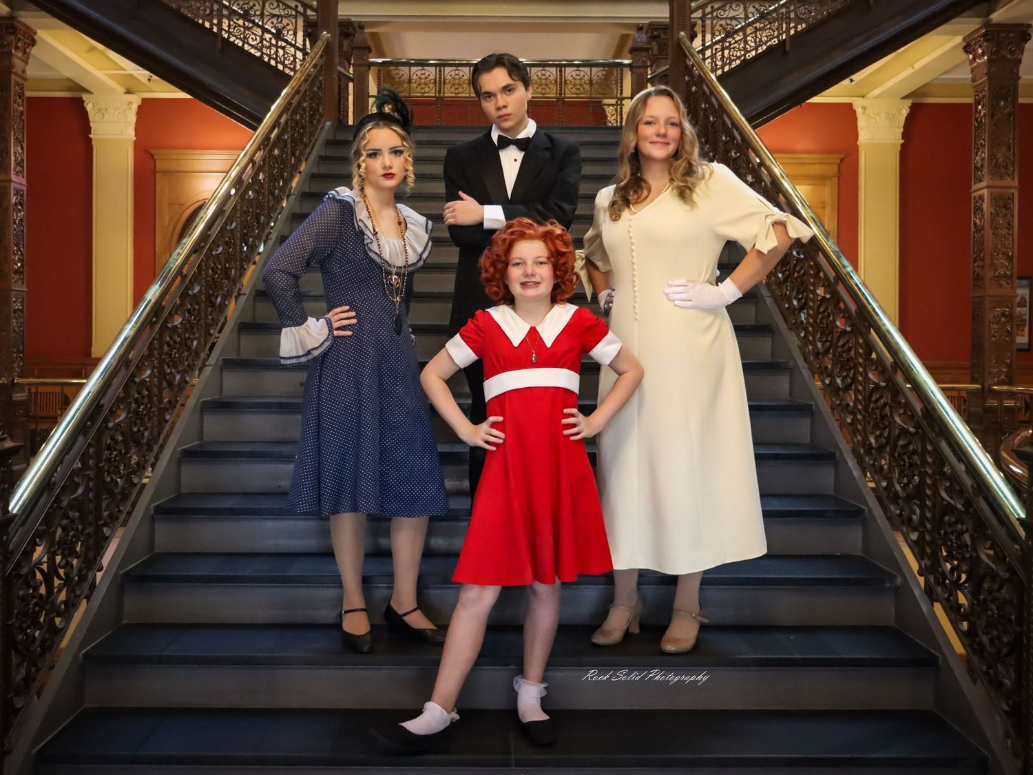 Theater Production- Browse official on-stage product images, dynamic cast photos, and scenic set designs for Annie at Bay City Central