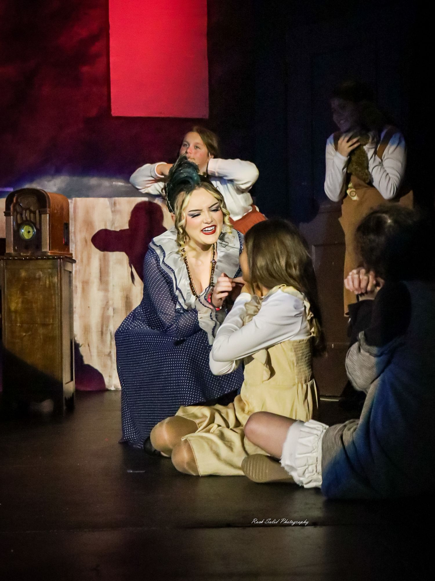 Theater Production- Browse official on-stage product images, dynamic cast photos, and scenic set designs for Annie at Bay City Central