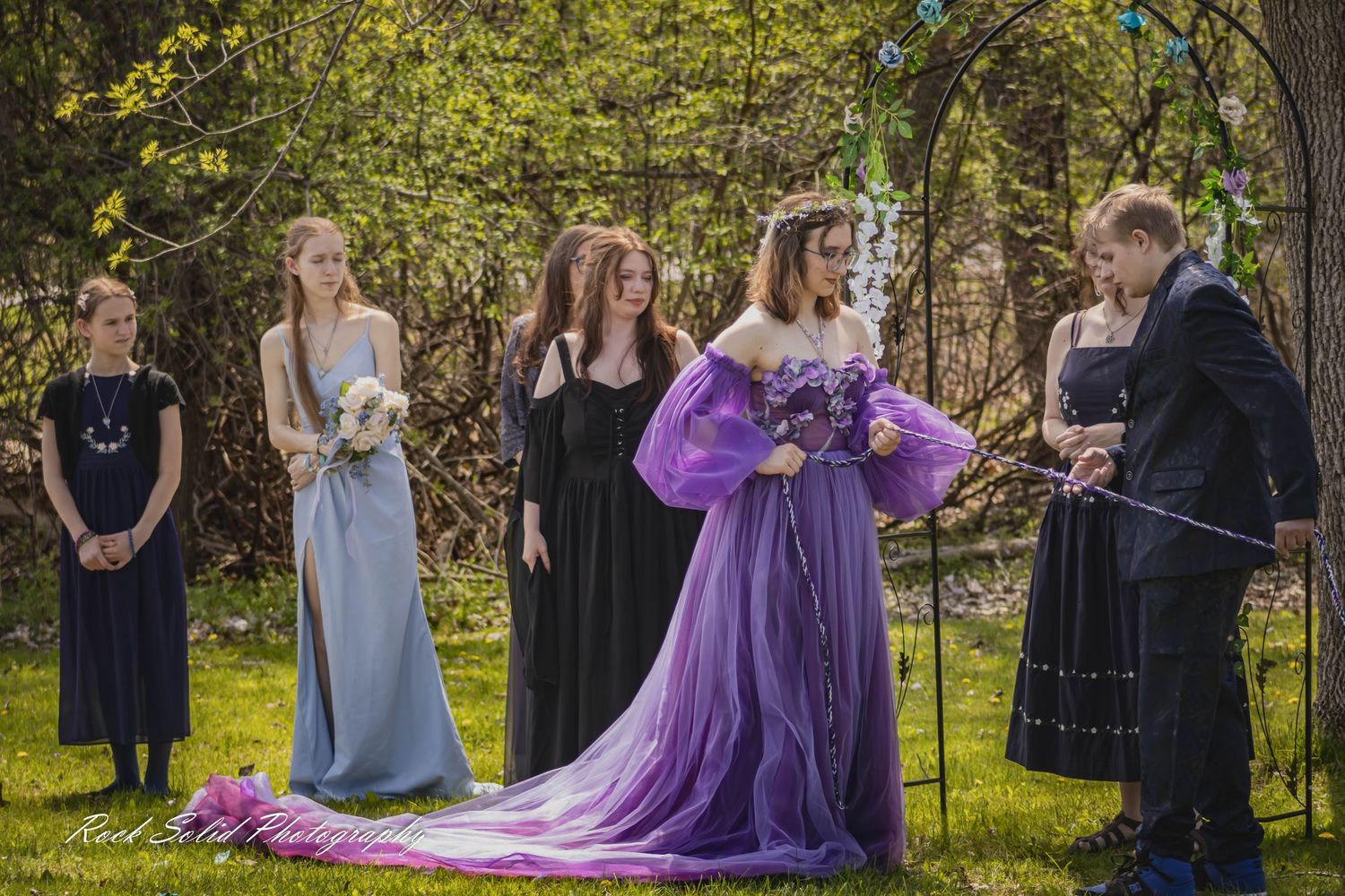 Life's beautiful milestones. Browse wedding processional photos, family event portraits, and cinematic portraits in Bay City, Michigan.