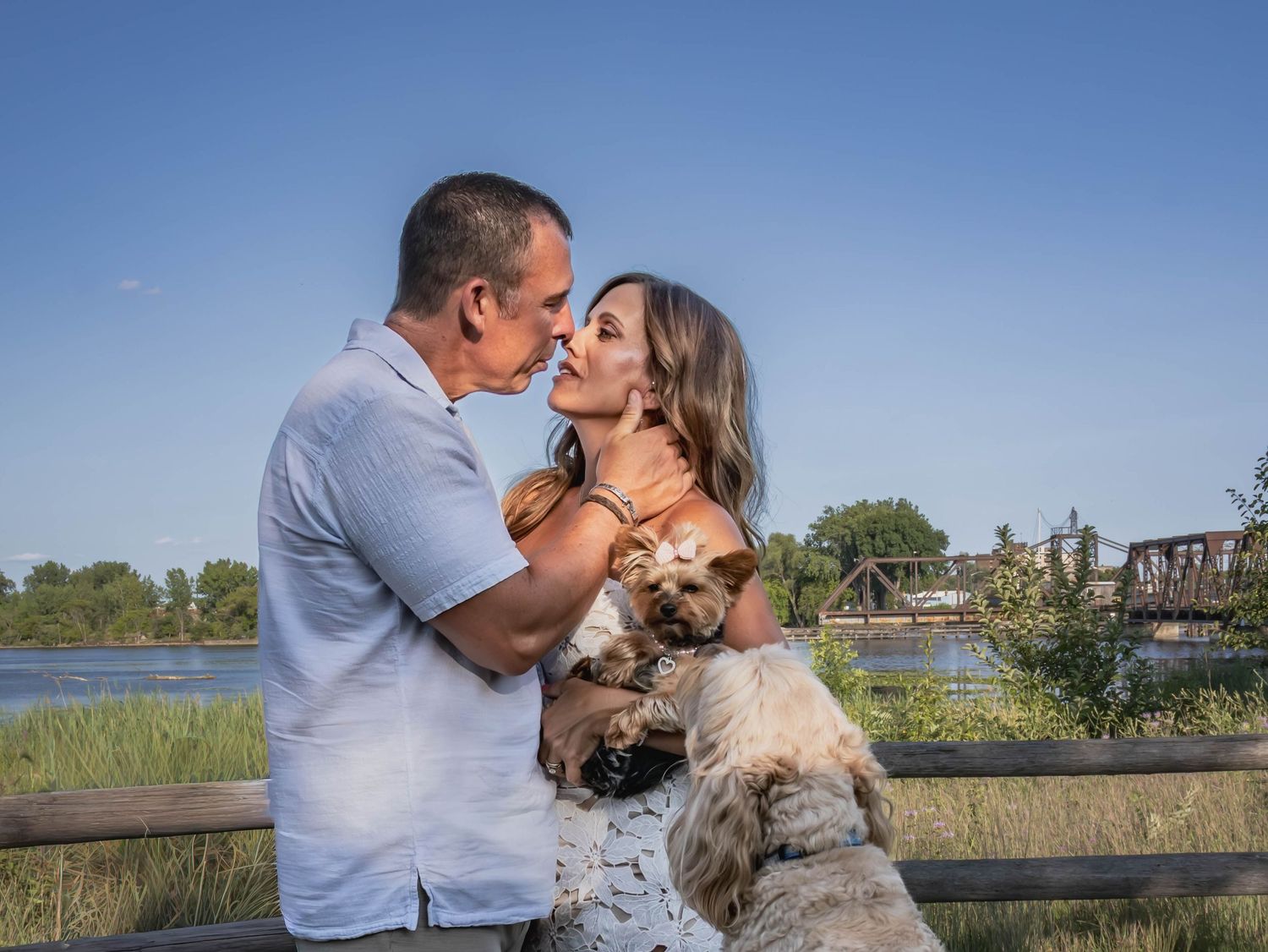 Top couple's photography session with puppies, Bay City, Michigan
