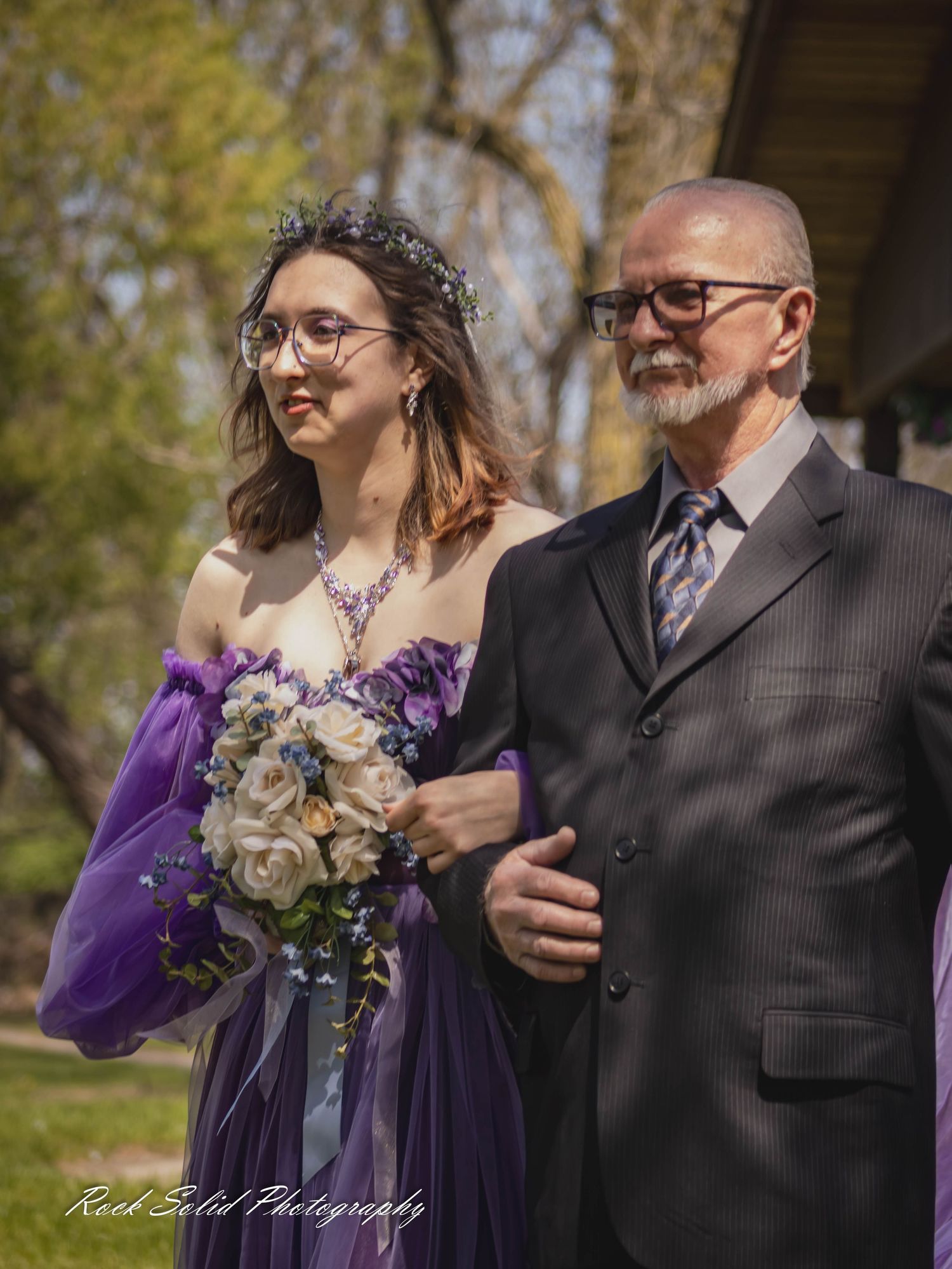 Life's beautiful milestones. Browse wedding processional photos, family event portraits, and cinematic portraits in Bay City, Michigan.