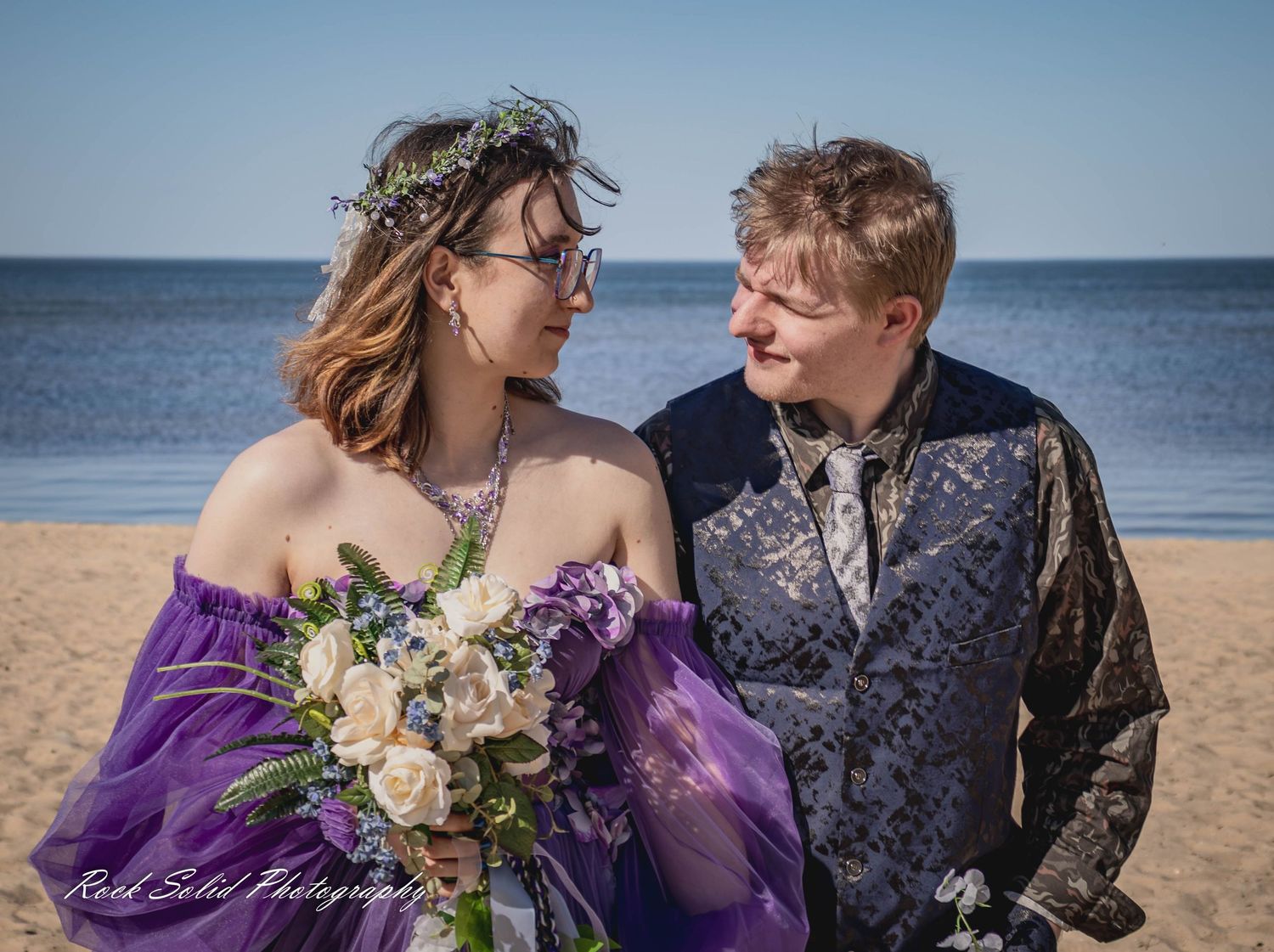 Life's beautiful milestones. Browse wedding processional photos, family event portraits, and cinematic portraits in Bay City, Michigan.