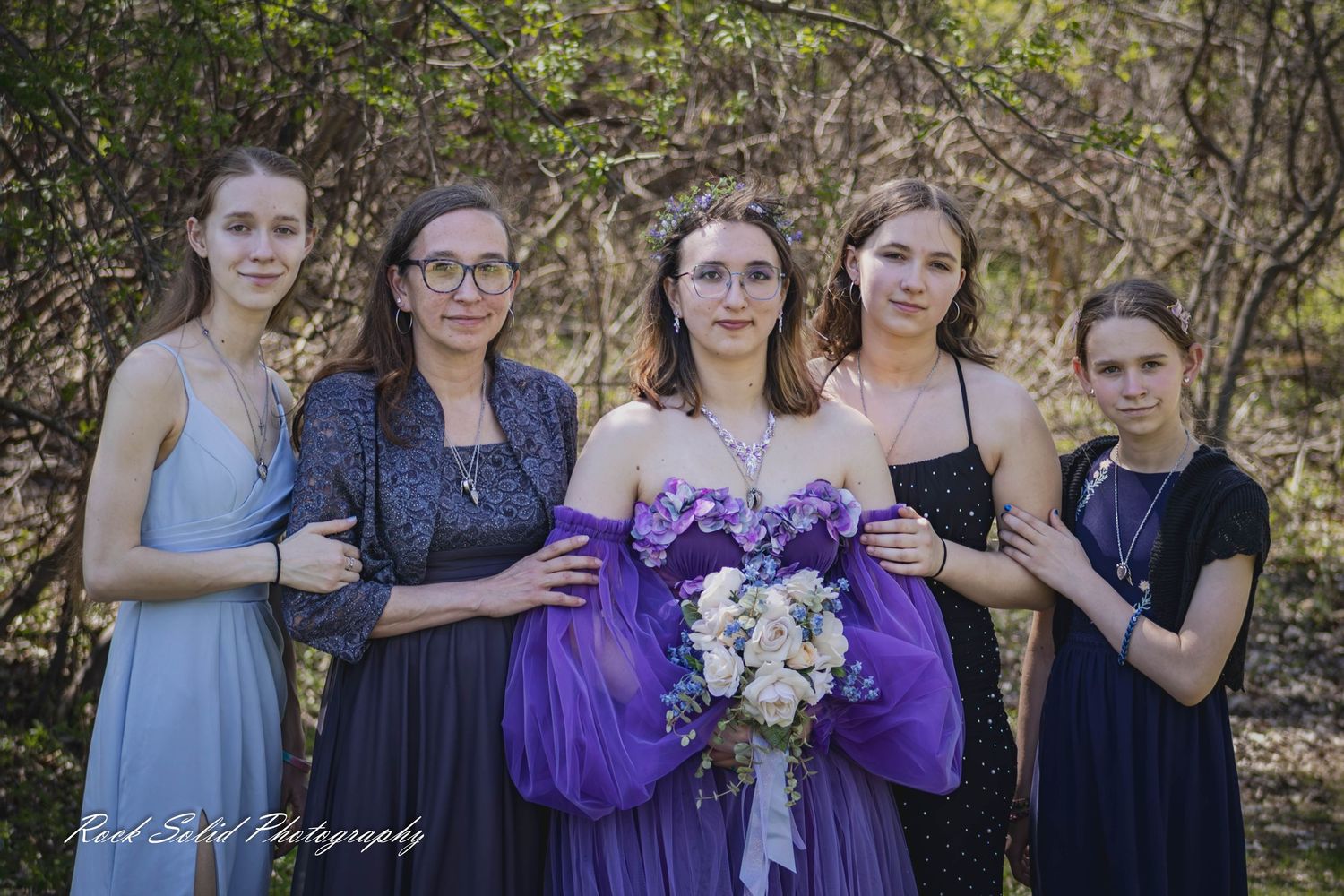 Life's beautiful milestones. Browse wedding processional photos, family event portraits, and cinematic portraits in Bay City, Michigan.