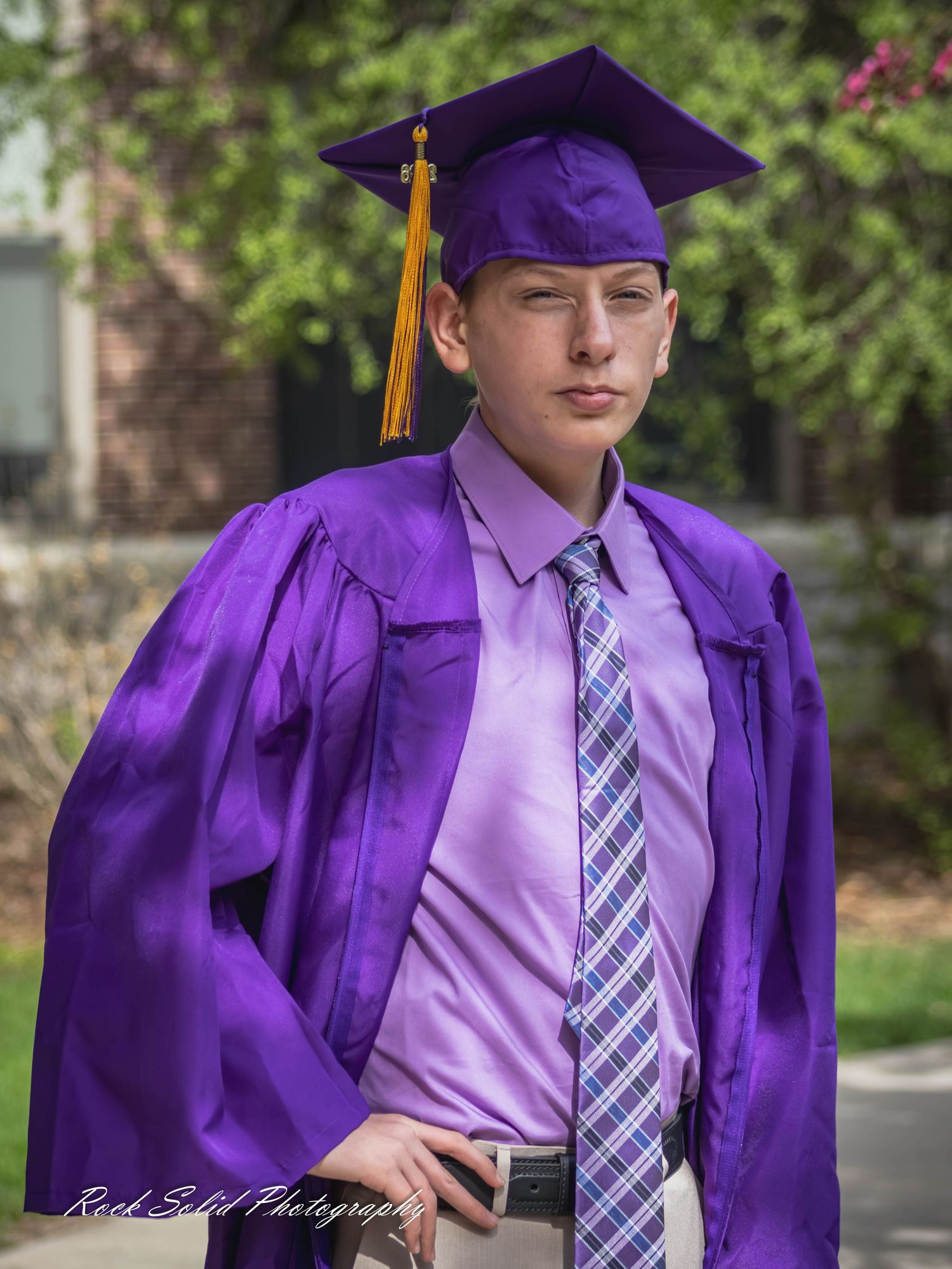 View high-quality Bay City Central High graduate. Browse professional cap & gown portraits and outdoor senior photos in Bay City, Mi.