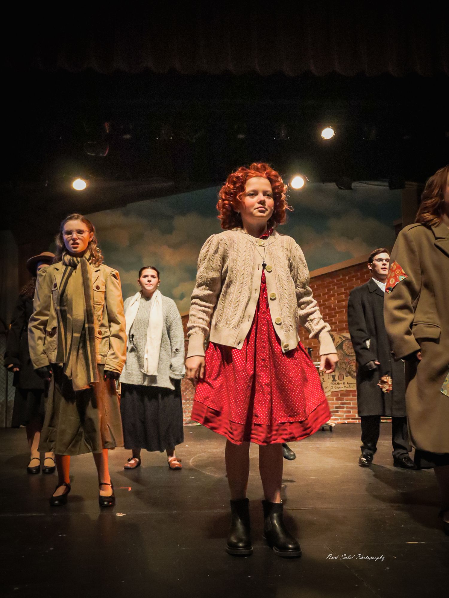 Theater Production- Browse official on-stage product images, dynamic cast photos, and scenic set designs for Annie at Bay City Central
