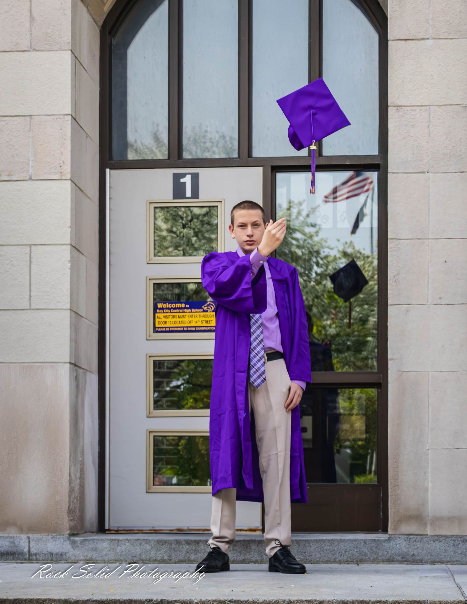 View high-quality Bay City Central High graduate. Browse professional cap & gown portraits and outdoor senior photos in Bay City, Mi.