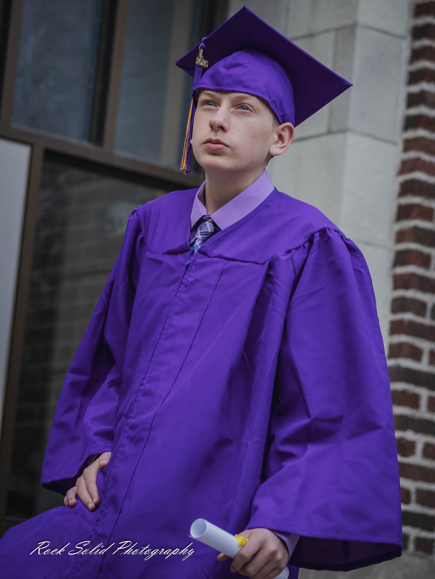 View high-quality Bay City Central High graduate. Browse professional cap & gown portraits and outdoor senior photos in Bay City, Mi.