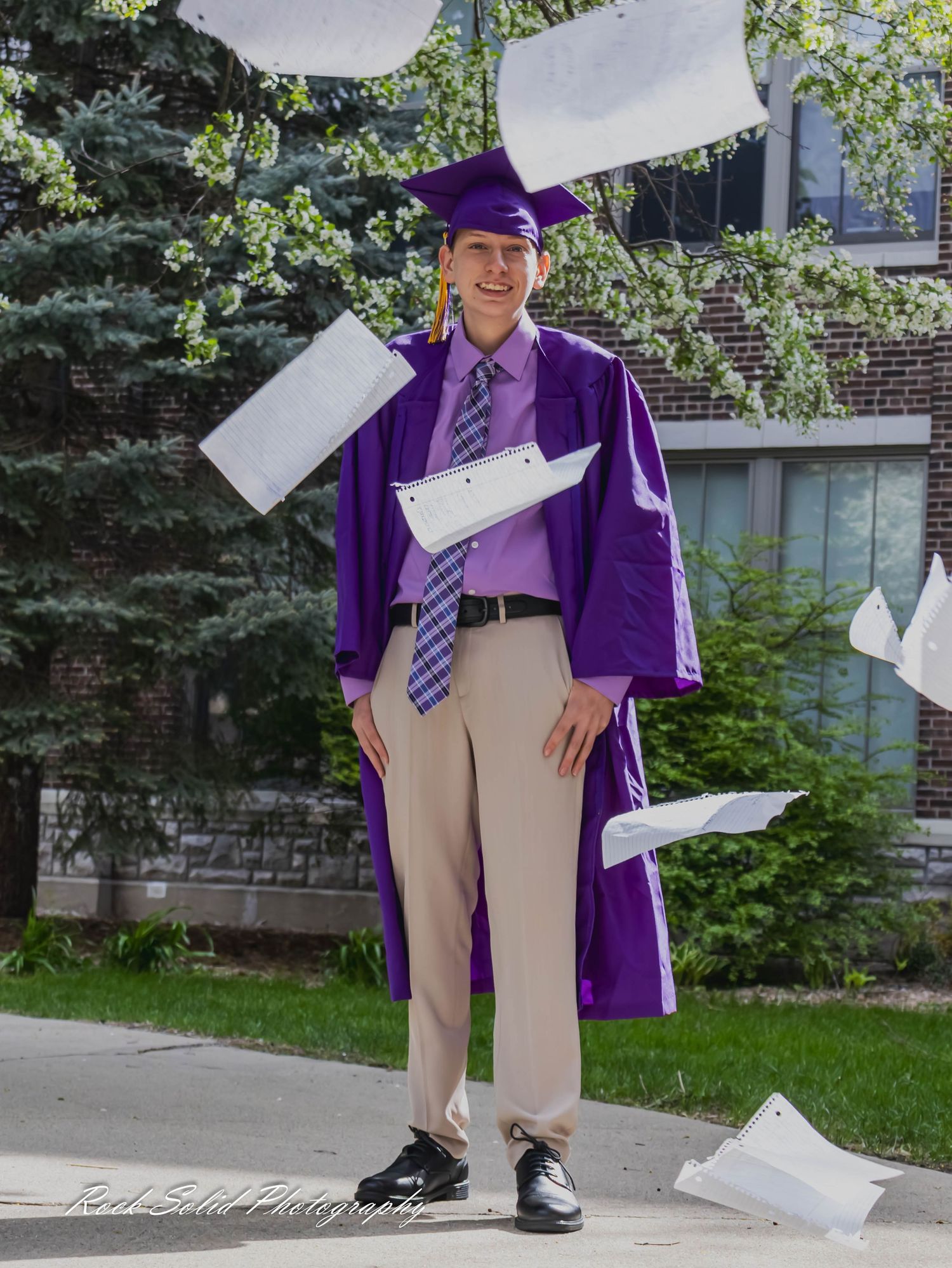View high-quality Bay City Central High graduate. Browse professional cap & gown portraits and outdoor senior photos in Bay City, Mi.
