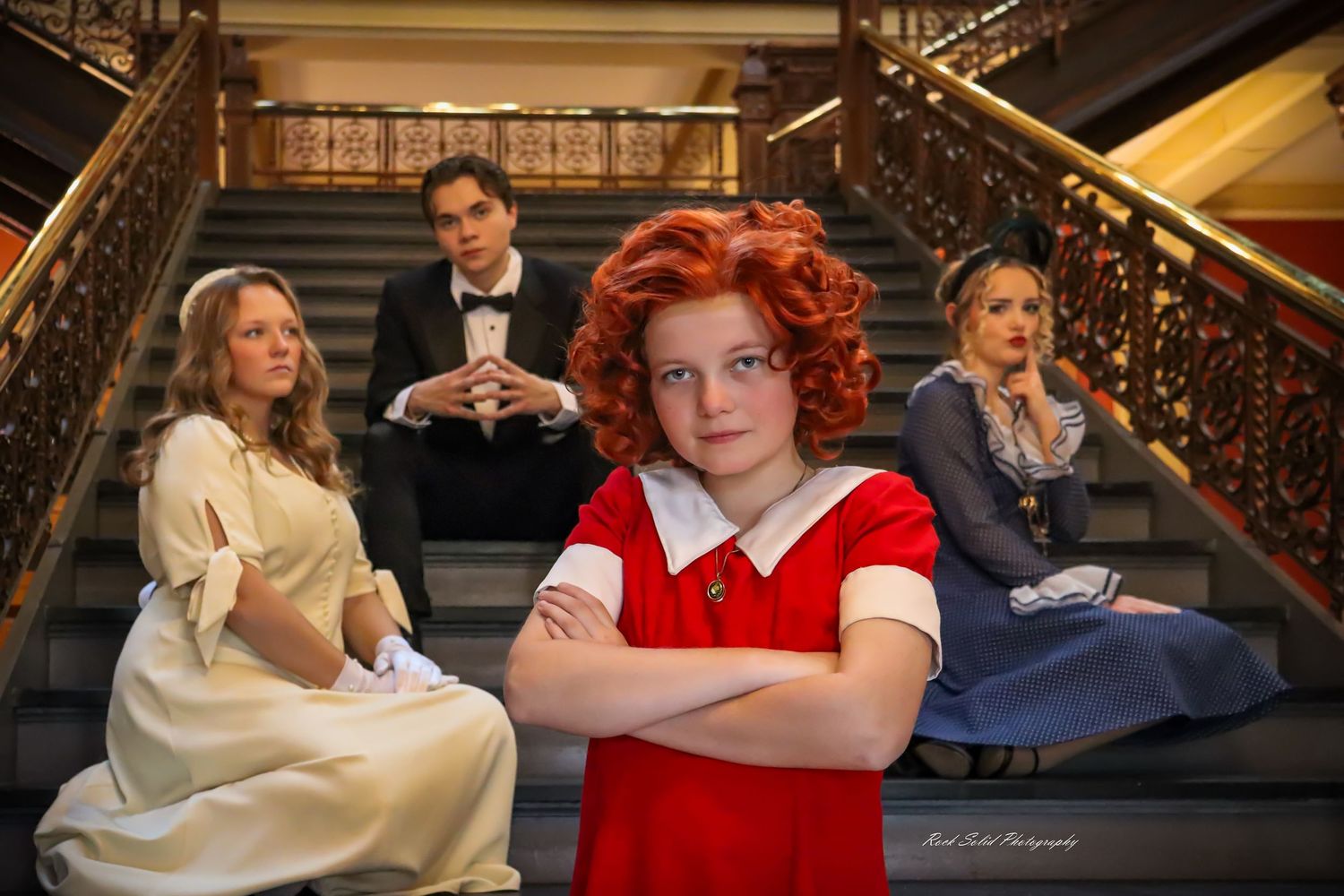 Theater Production- Browse official on-stage product images, dynamic cast photos, and scenic set designs for Annie at Bay City Central
