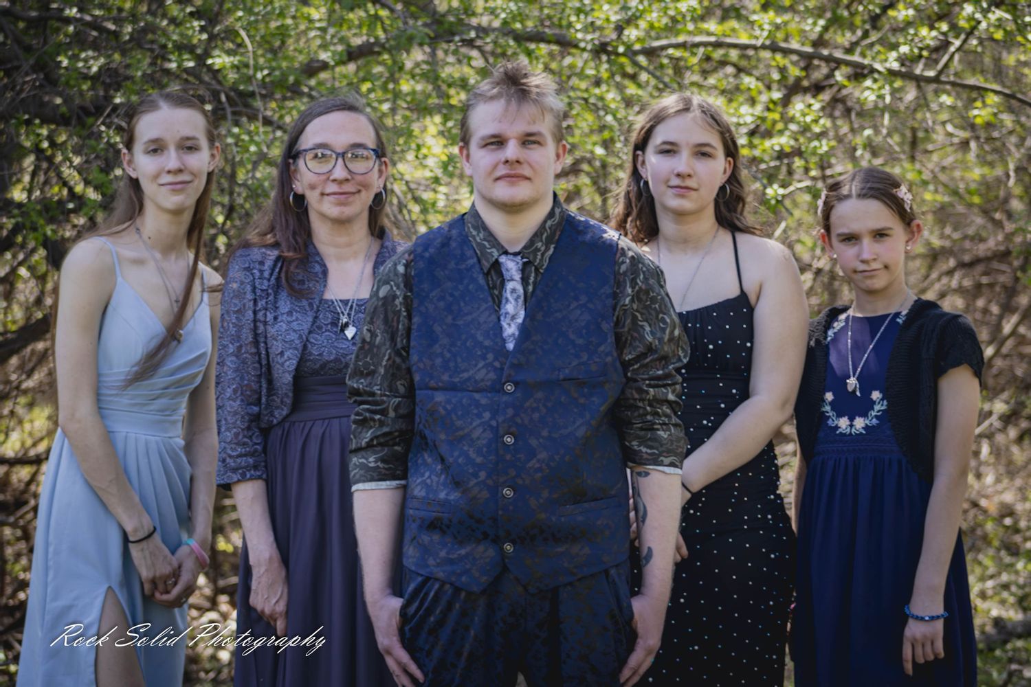 Life's beautiful milestones. Browse wedding processional photos, family event portraits, and cinematic portraits in Bay City, Michigan.