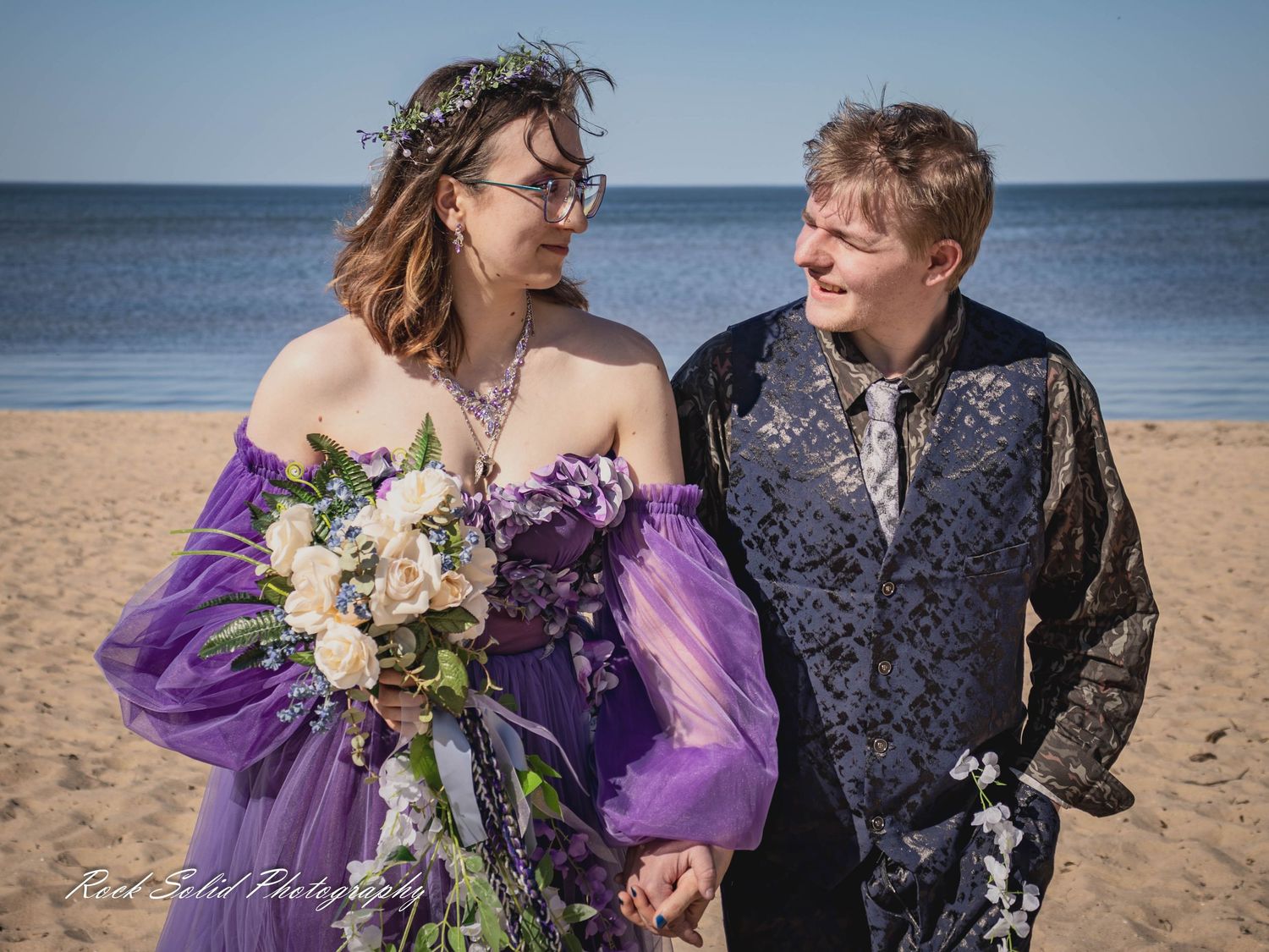 Life's beautiful milestones. Browse wedding processional photos, family event portraits, and cinematic portraits in Bay City, Michigan.