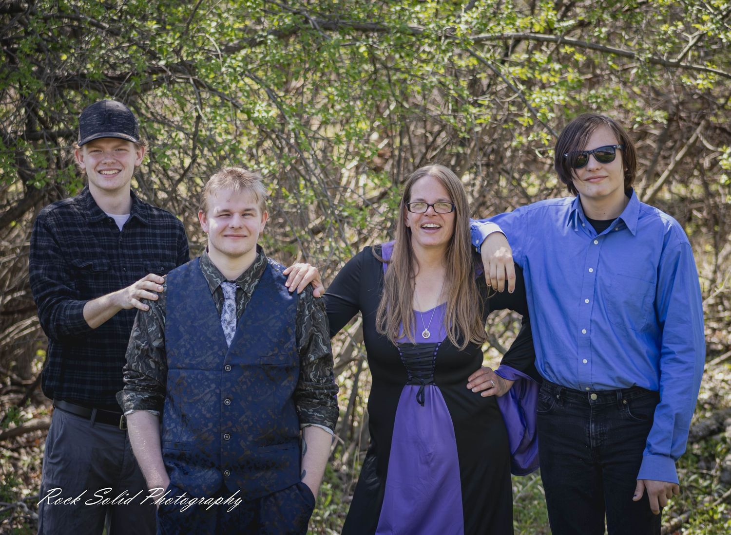 Life's beautiful milestones. Browse wedding processional photos, family event portraits, and cinematic portraits in Bay City, Michigan.