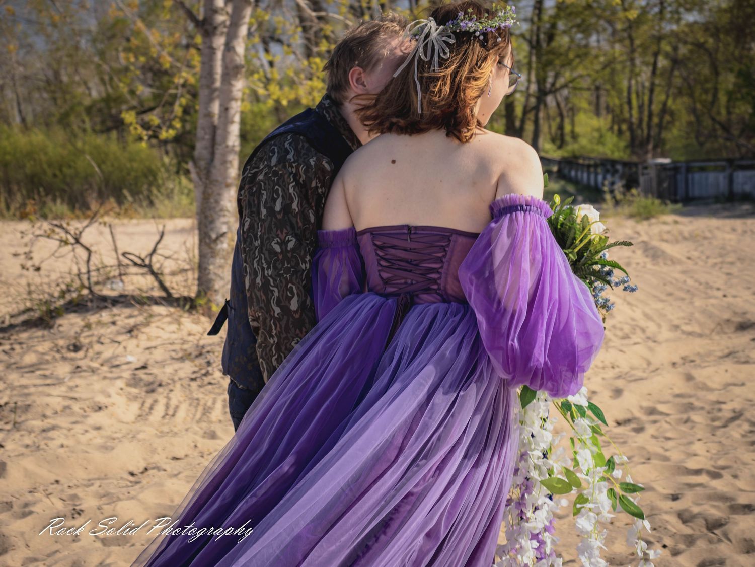 Life's beautiful milestones. Browse wedding processional photos, family event portraits, and cinematic portraits in Bay City, Michigan.