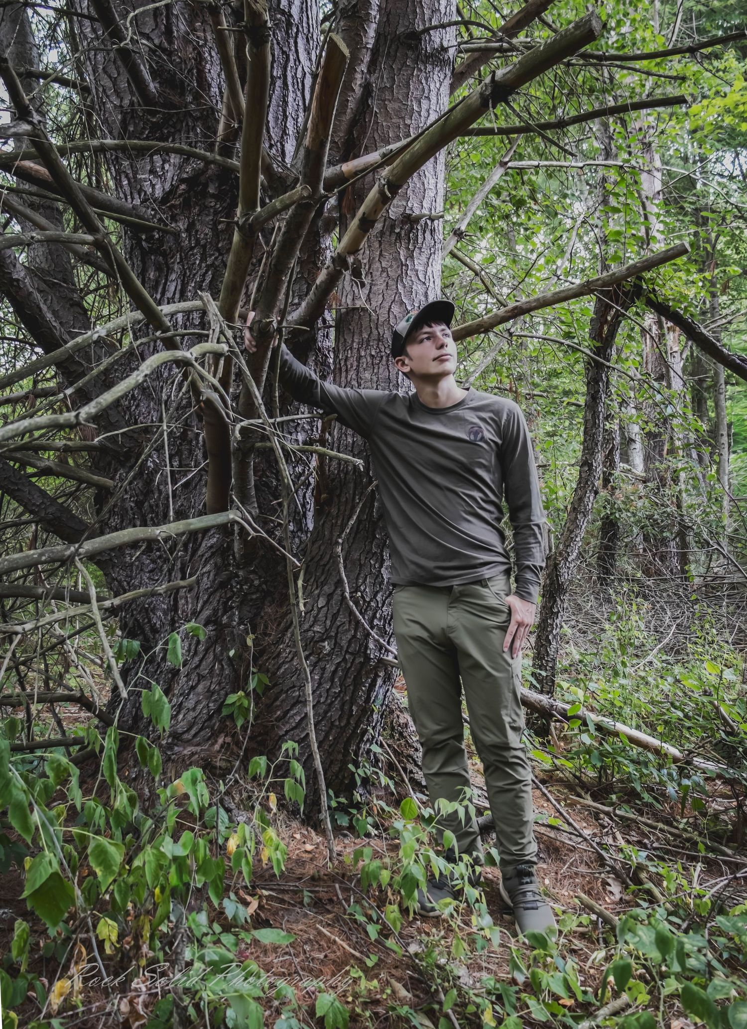 top men's, senior picture session in the woods, Coleman, Mi