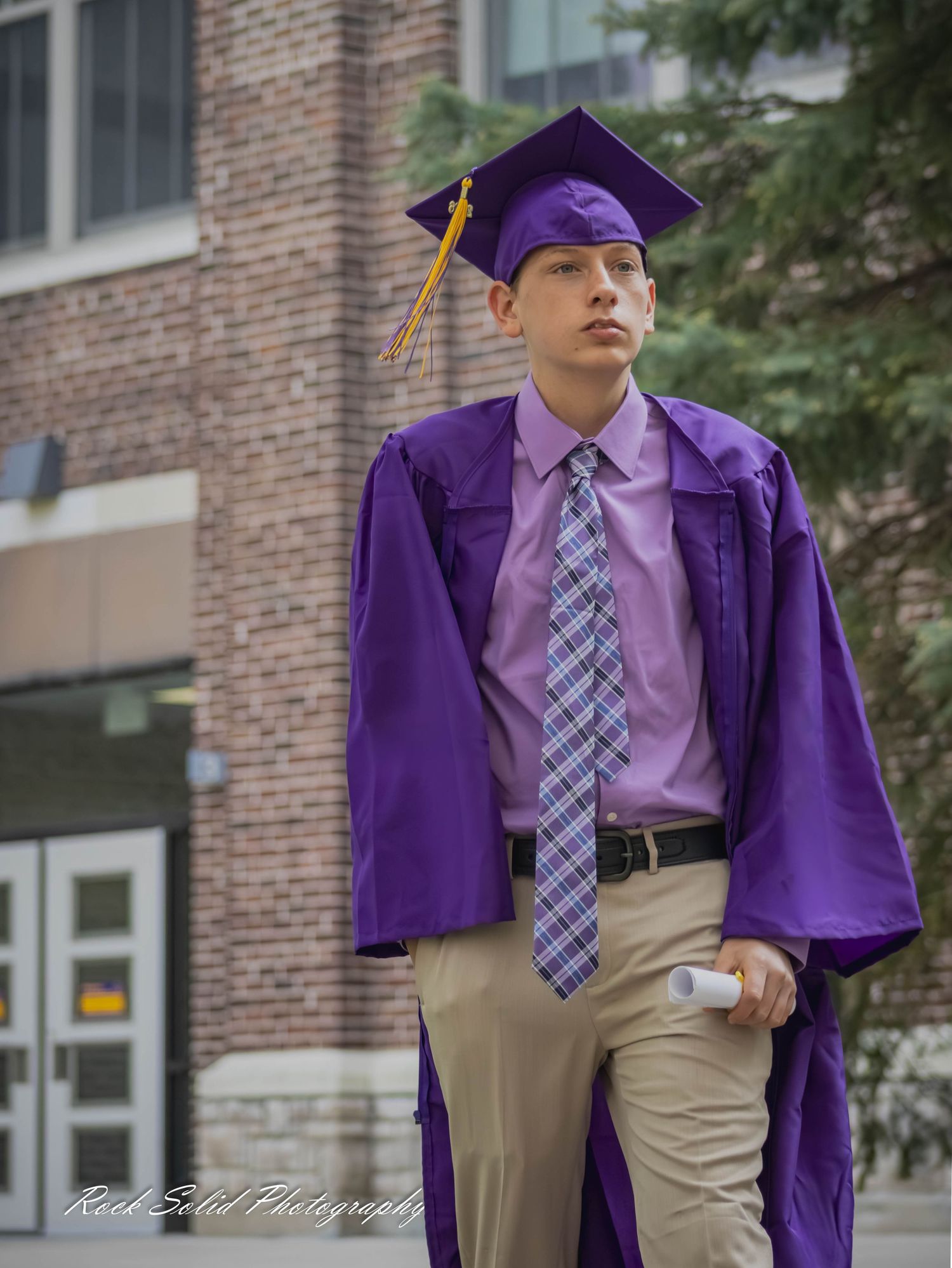 View high-quality Bay City Central High graduate. Browse professional cap & gown portraits and outdoor senior photos in Bay City, Mi.
