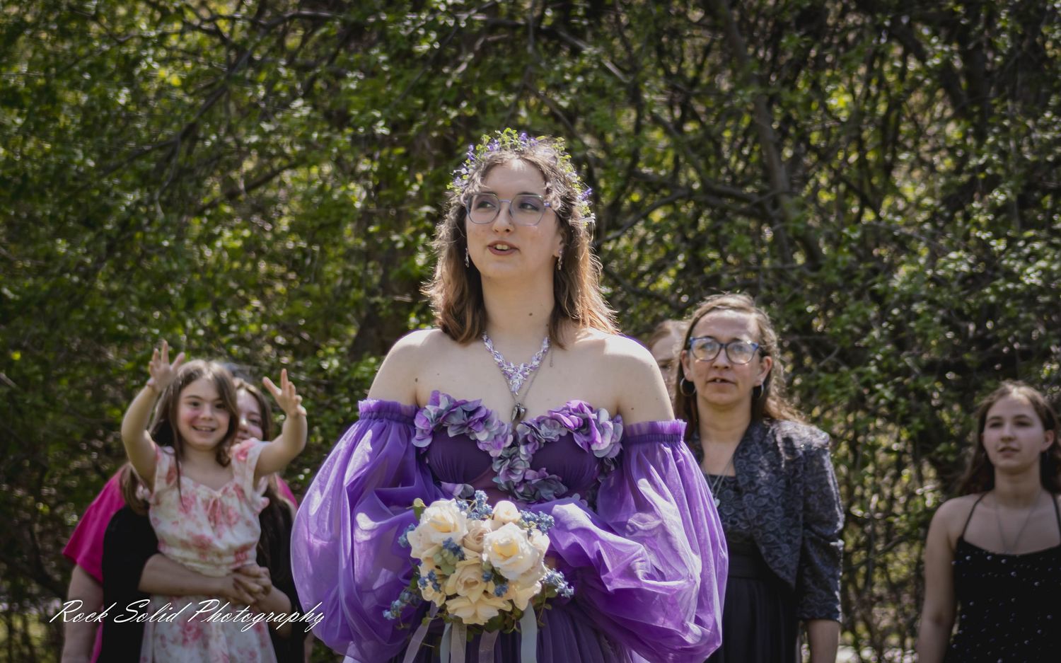 Life's beautiful milestones. Browse wedding processional photos, family event portraits, and cinematic portraits in Bay City, Michigan.