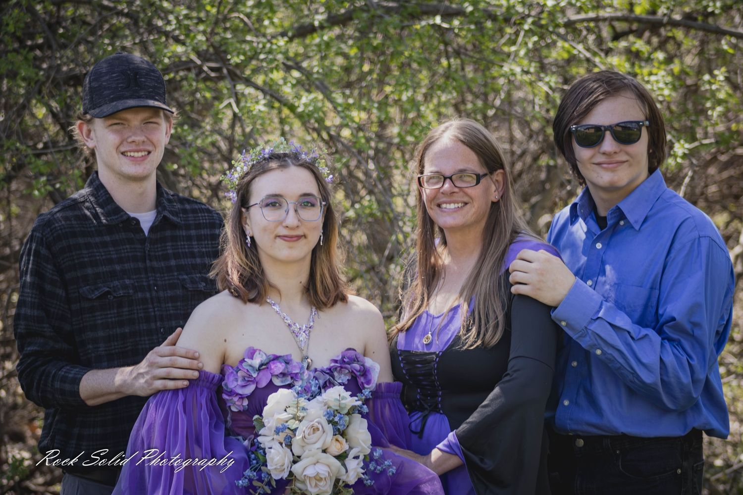 Life's beautiful milestones. Browse wedding processional photos, family event portraits, and cinematic portraits in Bay City, Michigan.