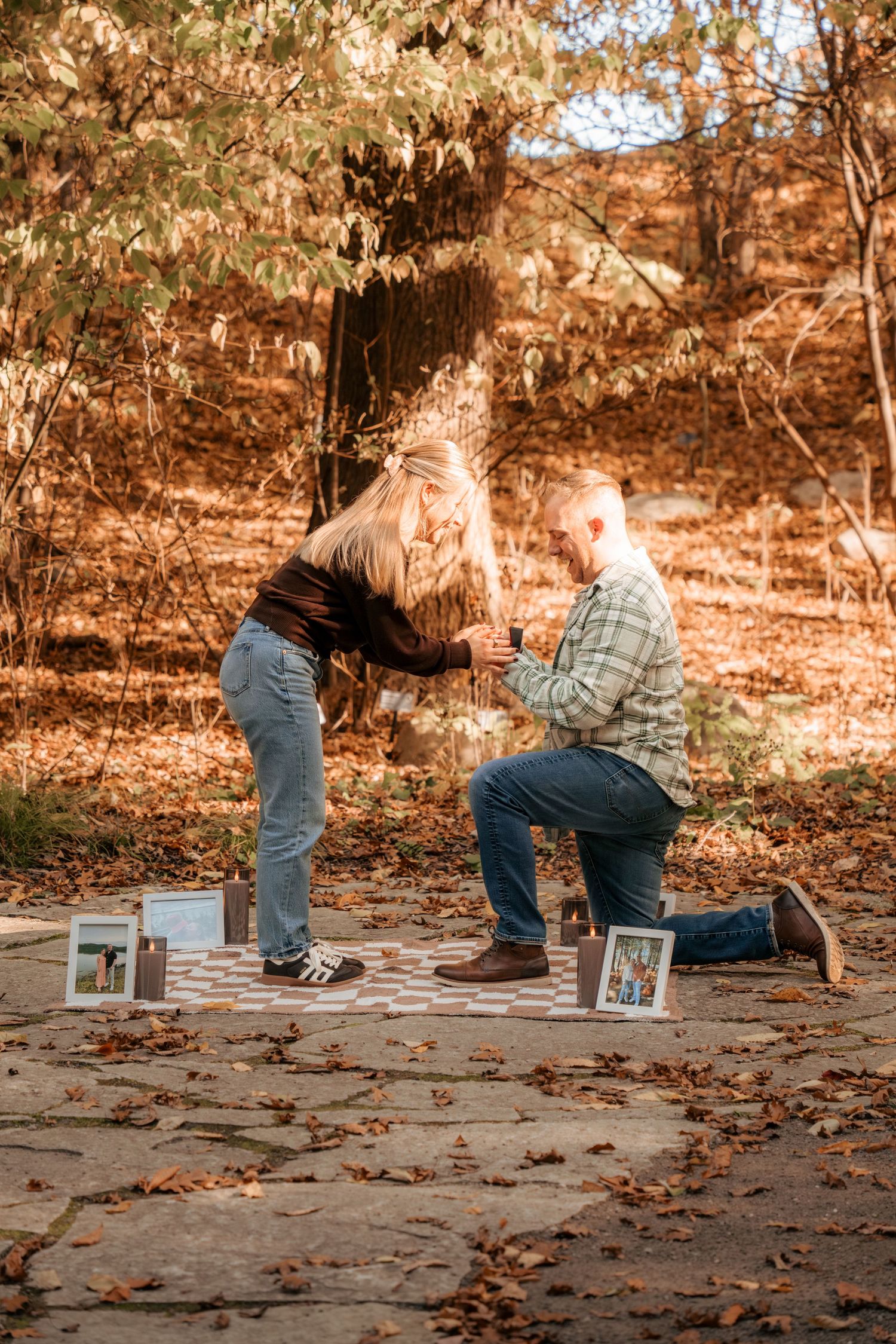 A sequence showing a surprise proposal moment on a leaf-covered walkway in autumn.