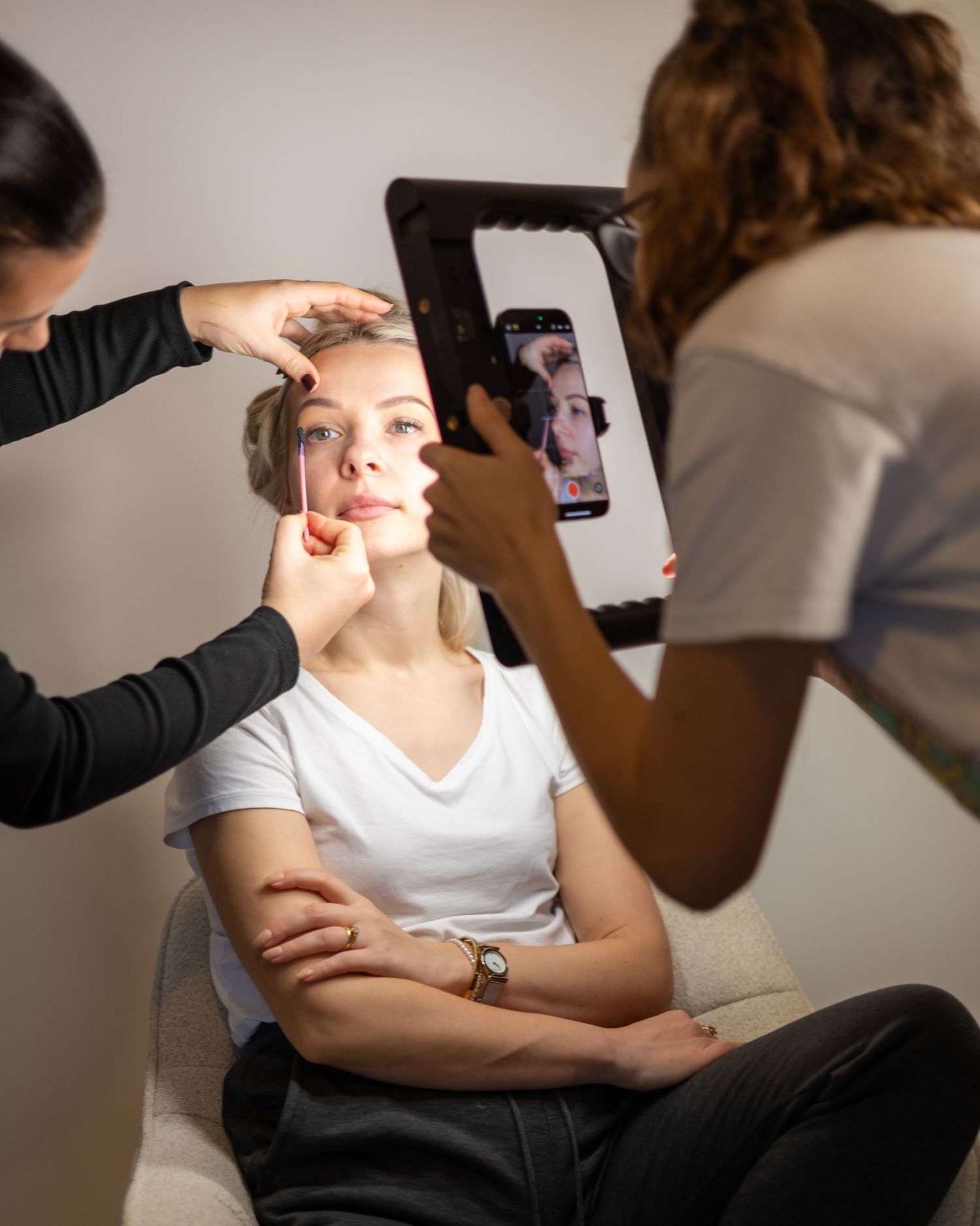 Make up and content creation on a model. Behind the scenes of a photoshoot