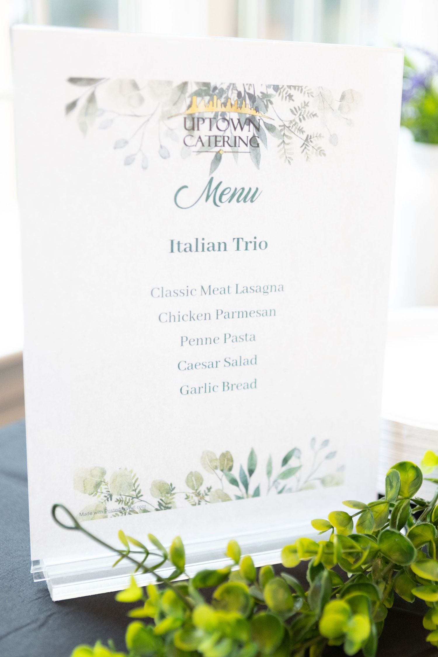Elegant wedding menu cards with floral design and Italian menu items listed.