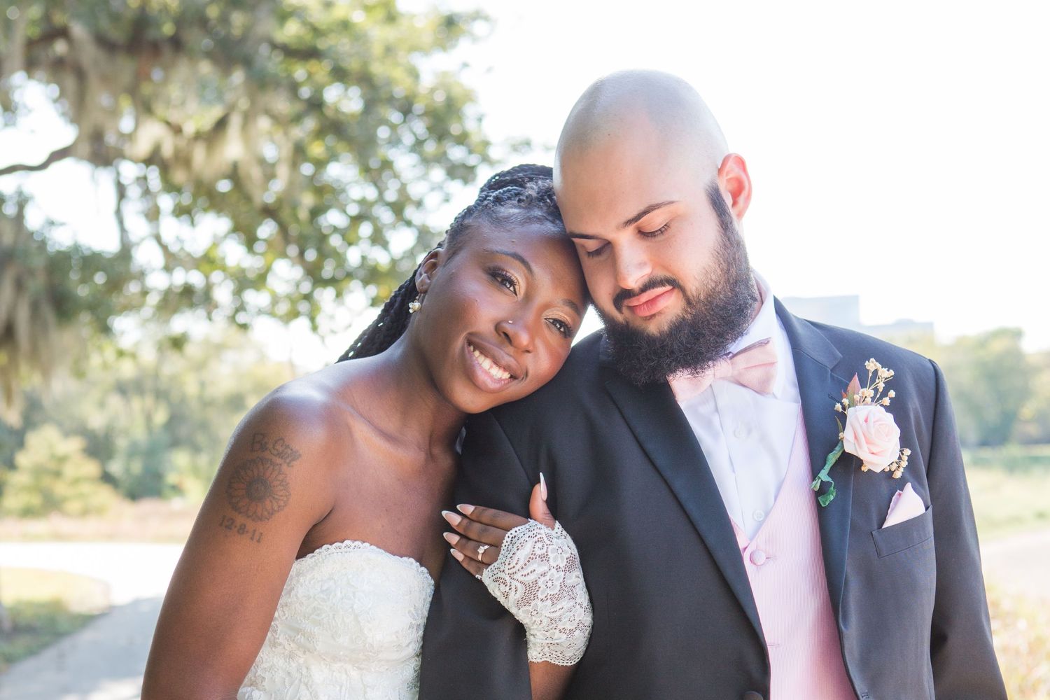 Intimate wedding couple moments captured in natural outdoor lighting.