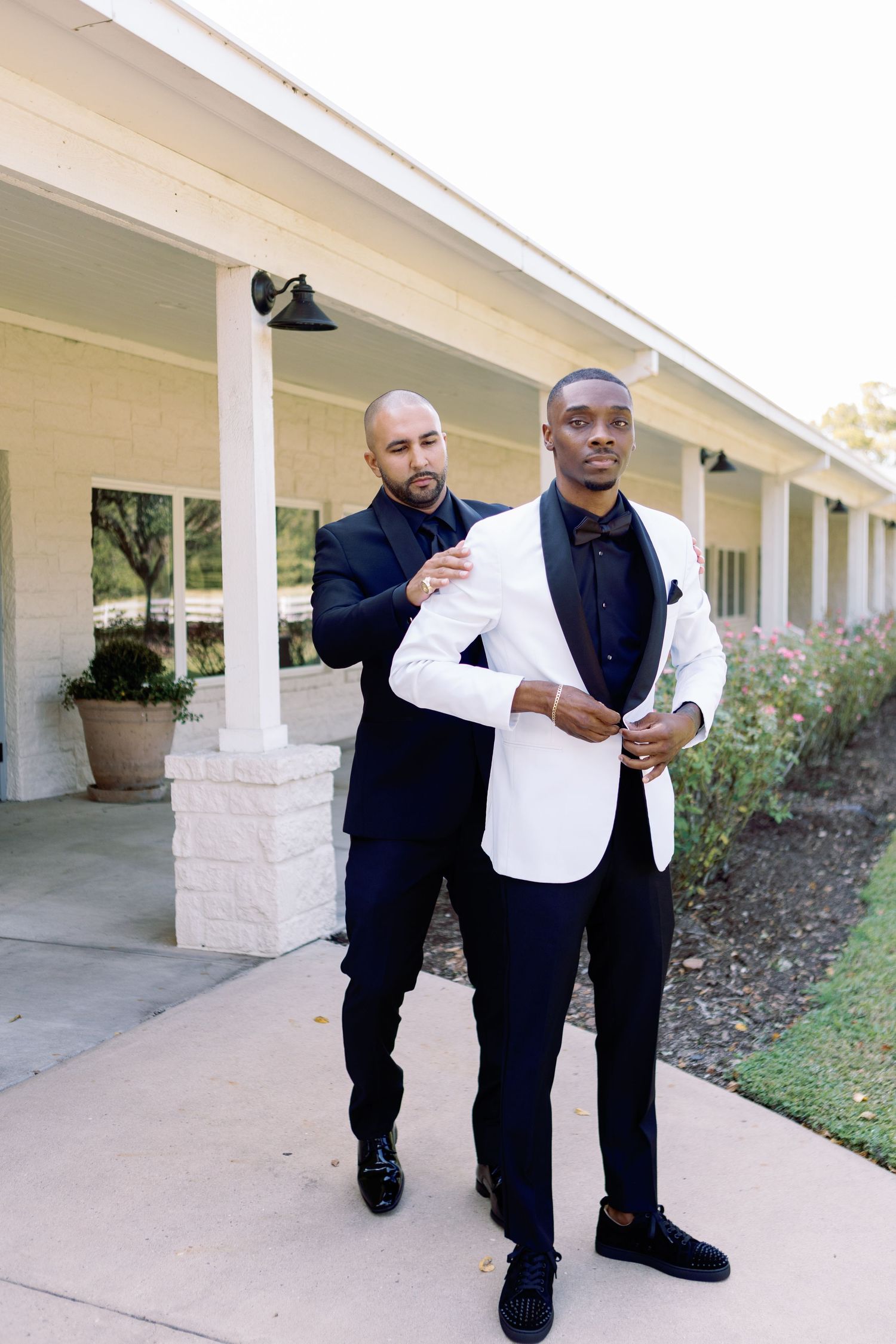 Men in formal black and white attire posing together in sequential outdoor shots.