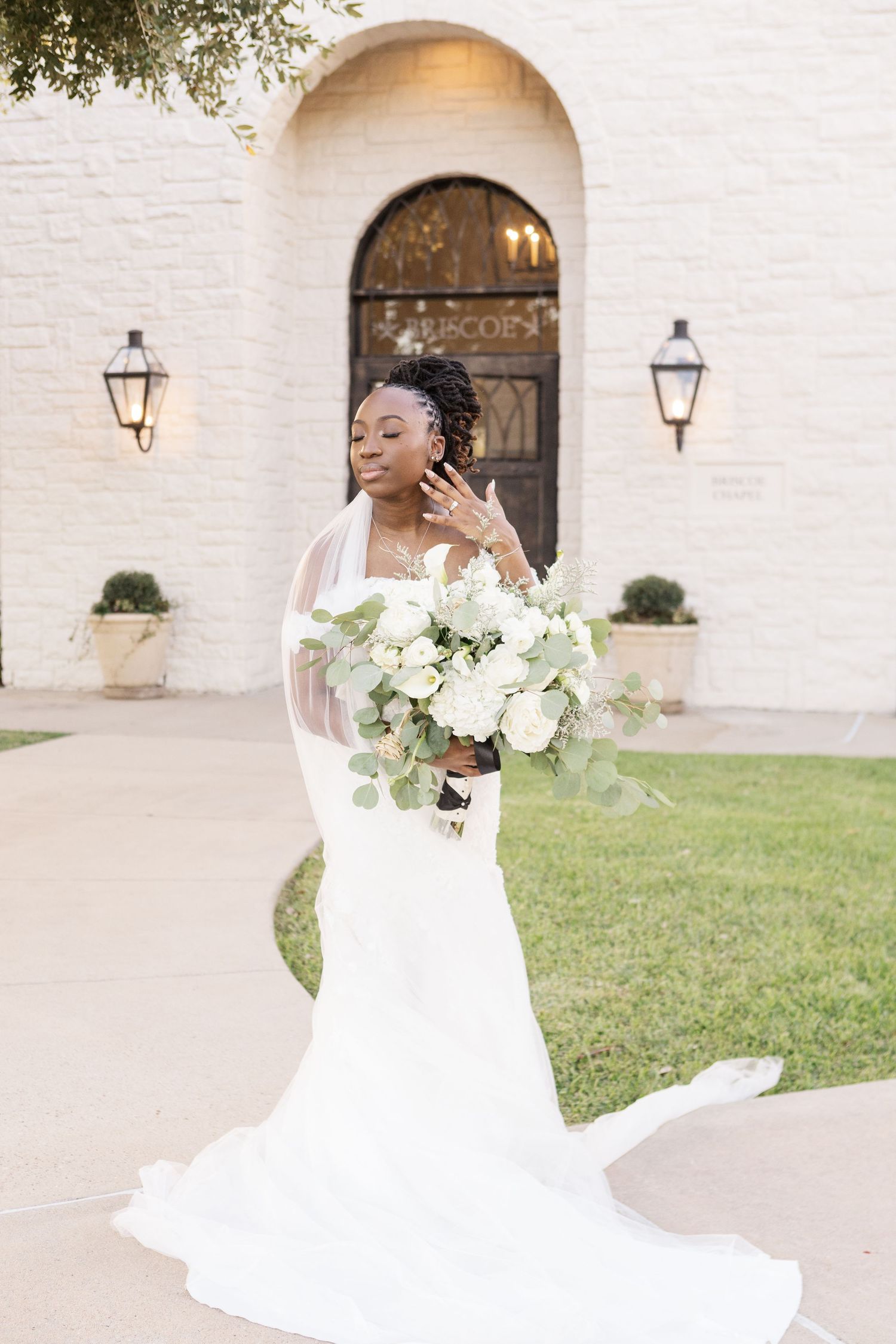 A series of bridal portraits showing a beautiful white wedding gown with a flowing train against a white building.