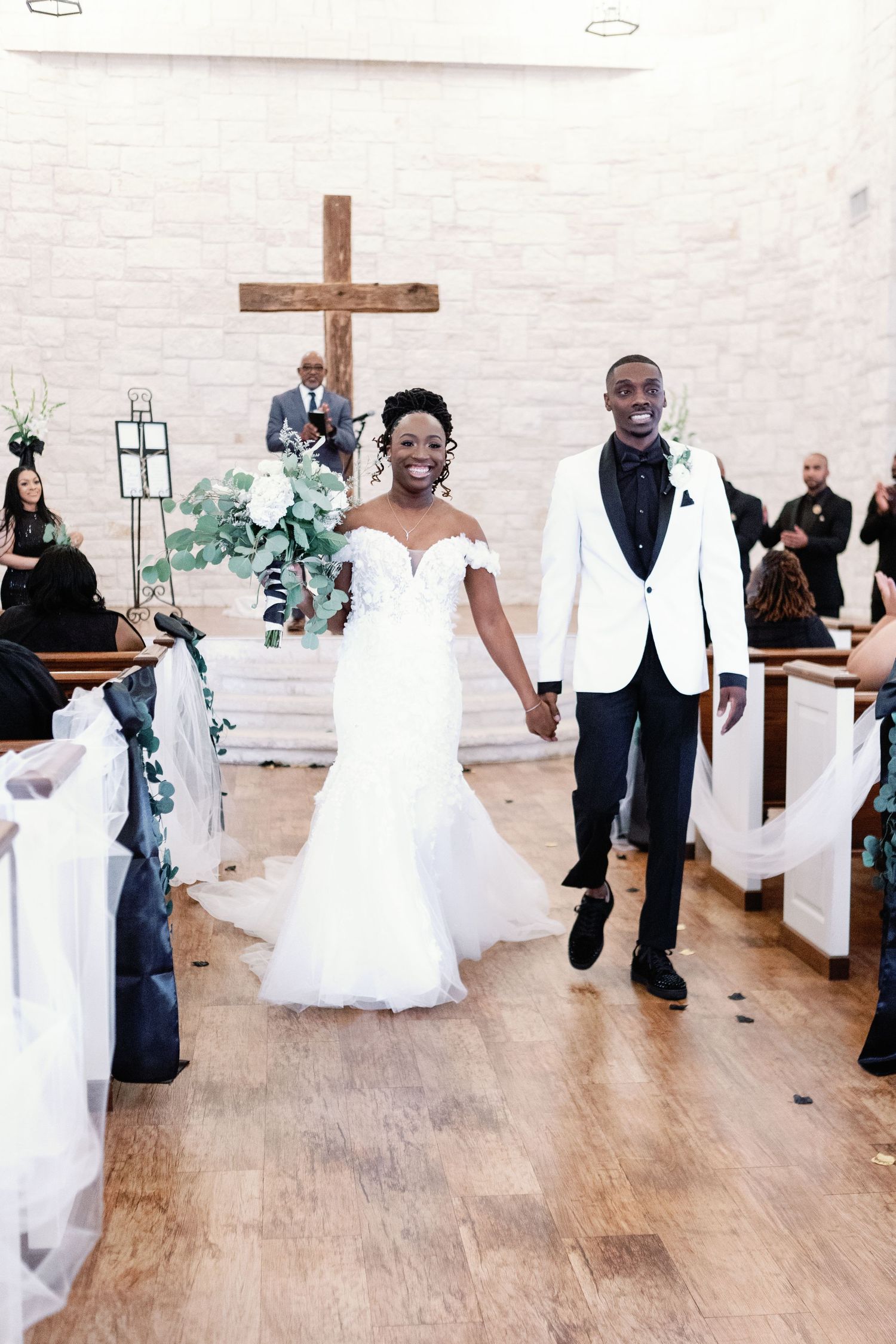 Wedding celebration sequence with dancing and joyful moments in a bright church setting.