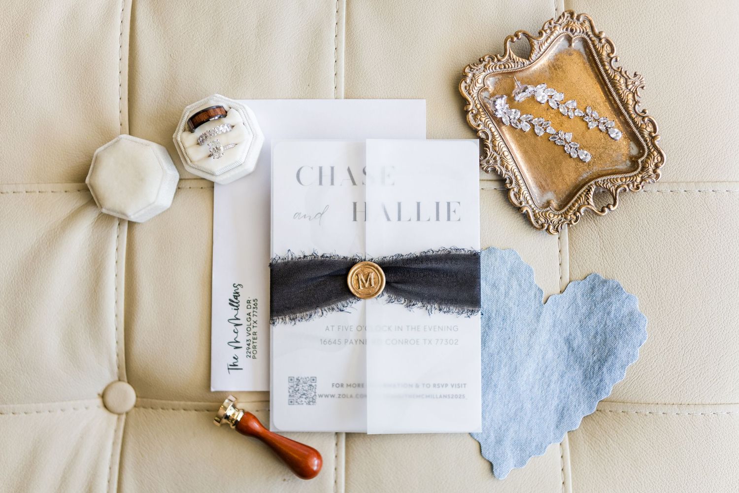 Wedding stationery and invitation suite with gold accents and blue details.