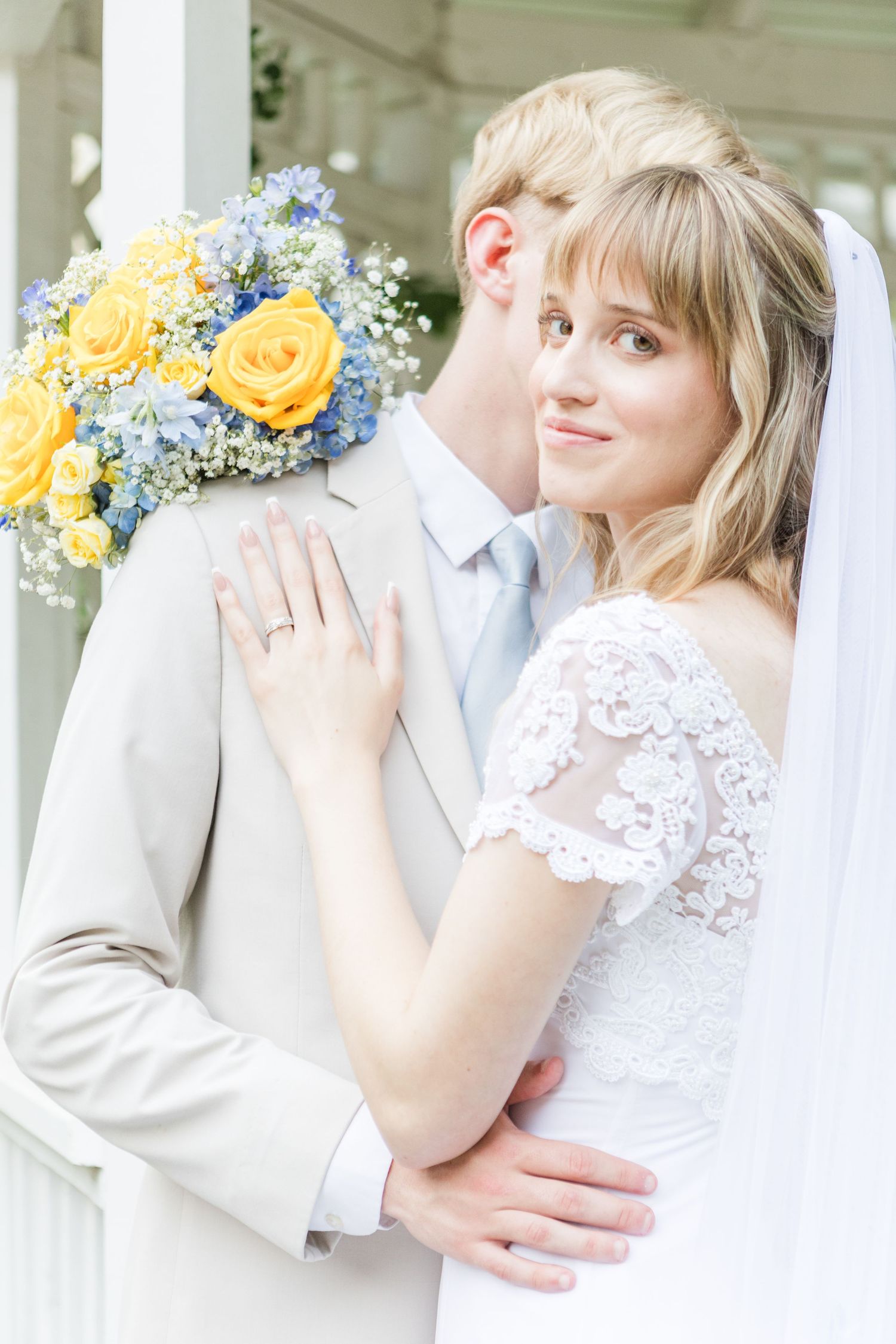 A wedding portrait series showing romantic moments with yellow rose bouquet accents.