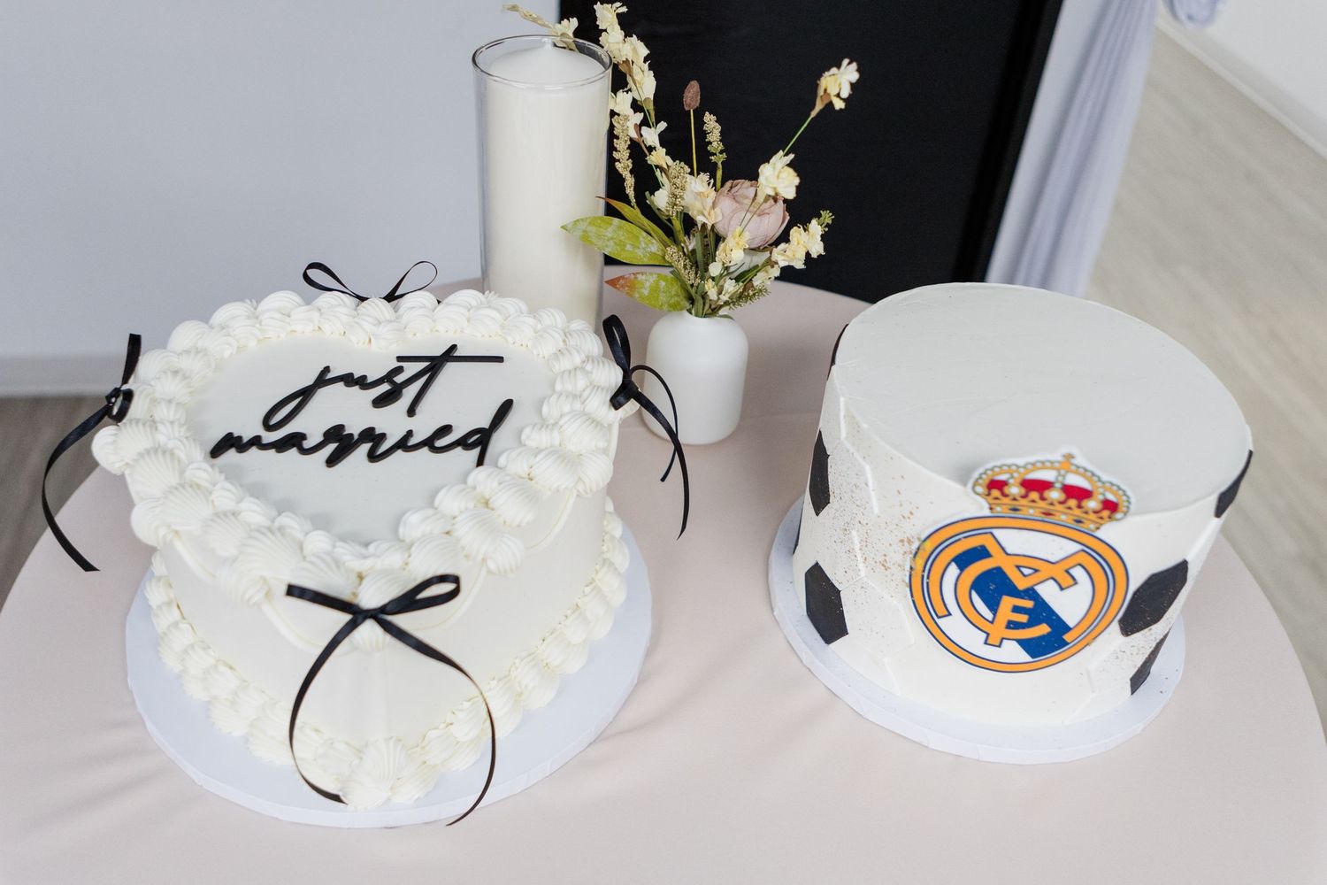 Series of white wedding cakes with delicate bow decorations.