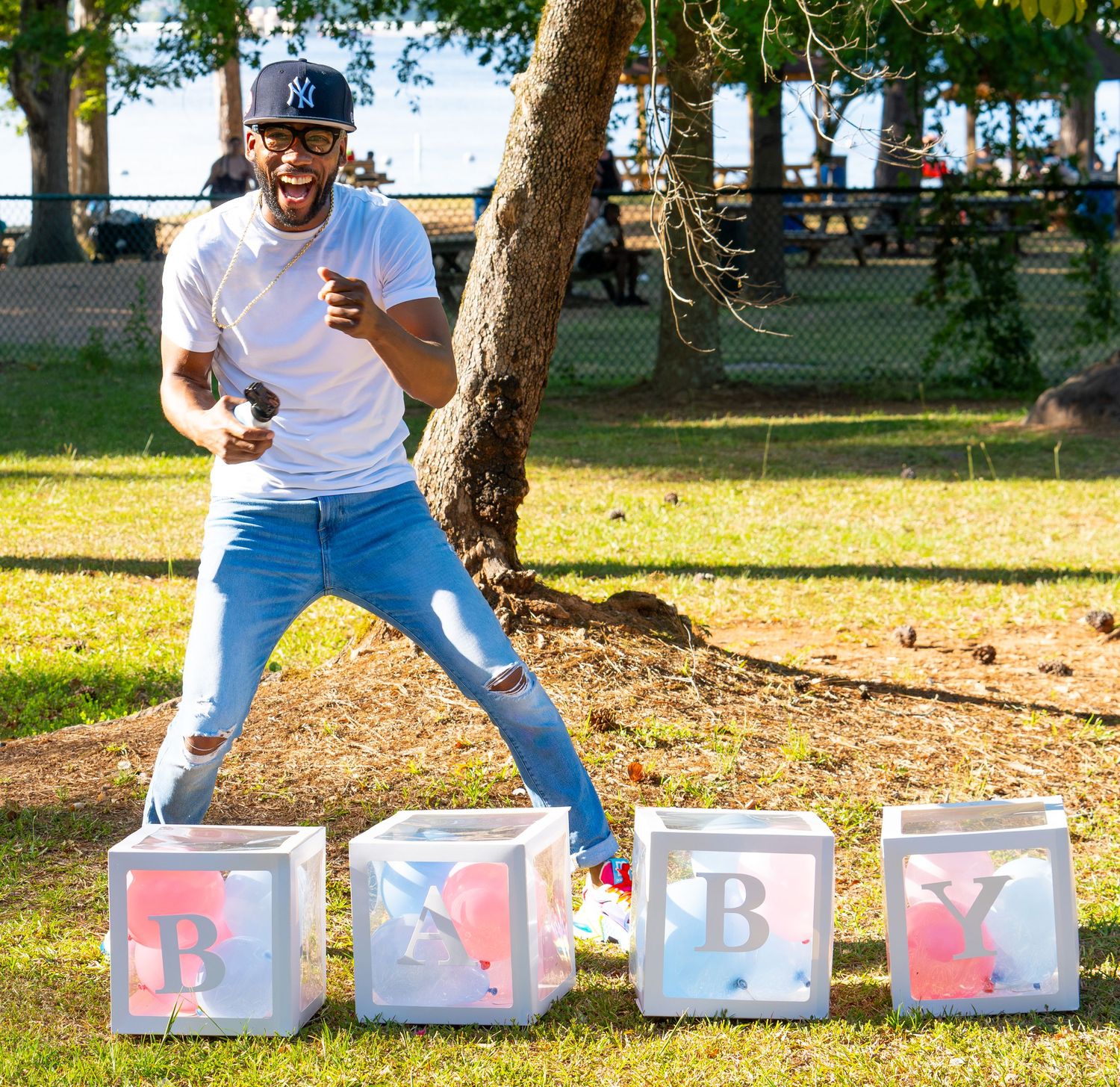Progressive sequence showing person interacting with baby-themed letter blocks outdoors.