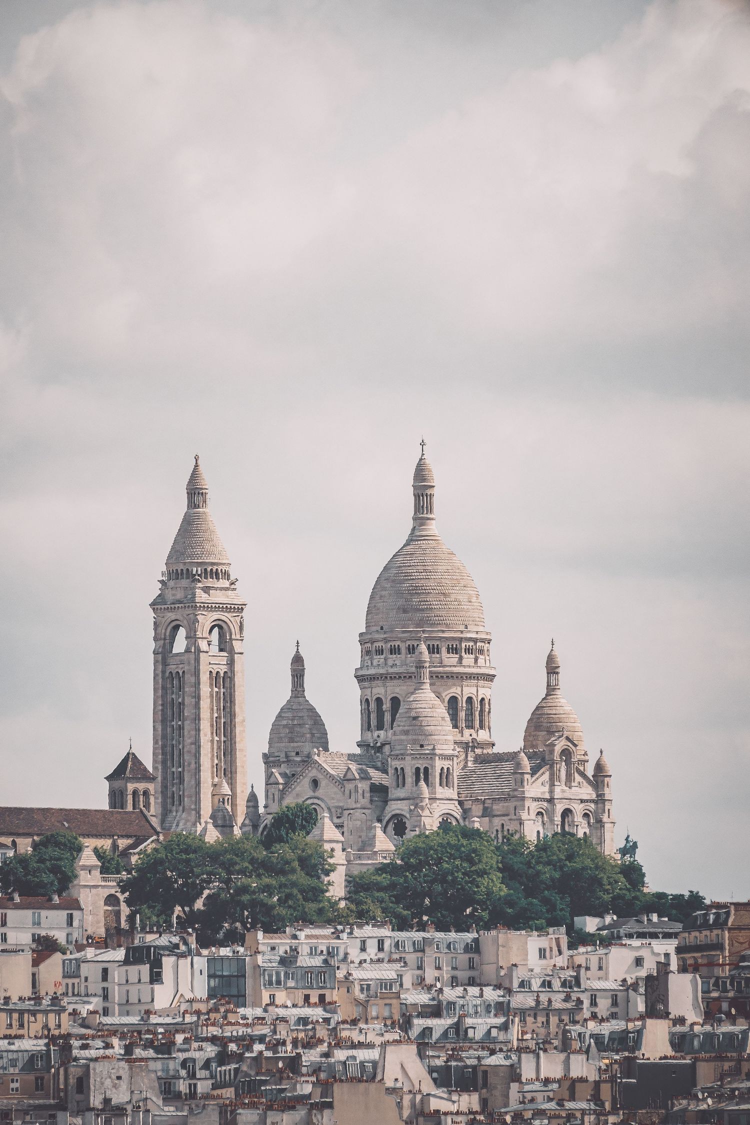 Sacré-Cœur Basilica perched on Montmartre hill overlooking Paris.