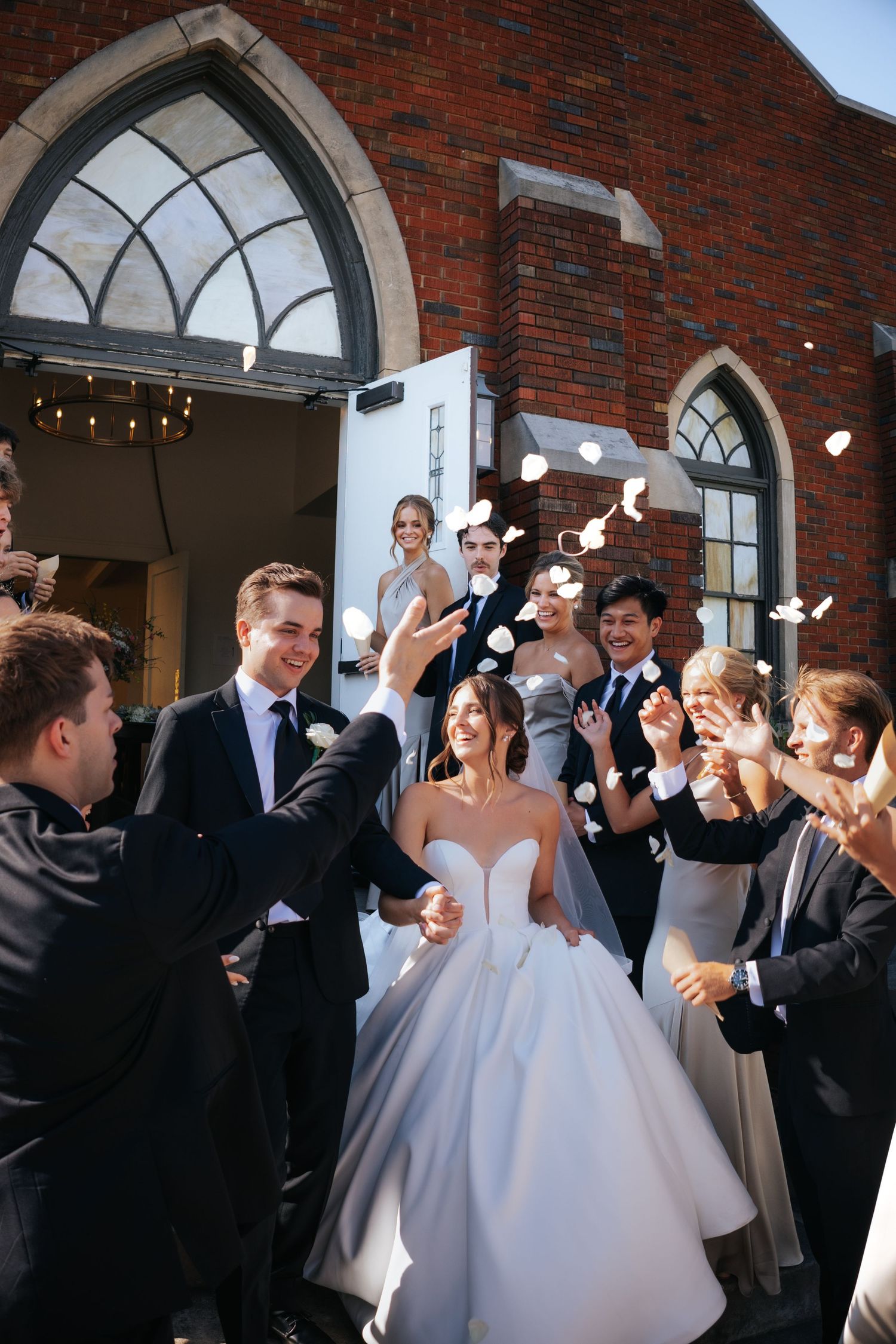 Wedding grand exit with flower petals