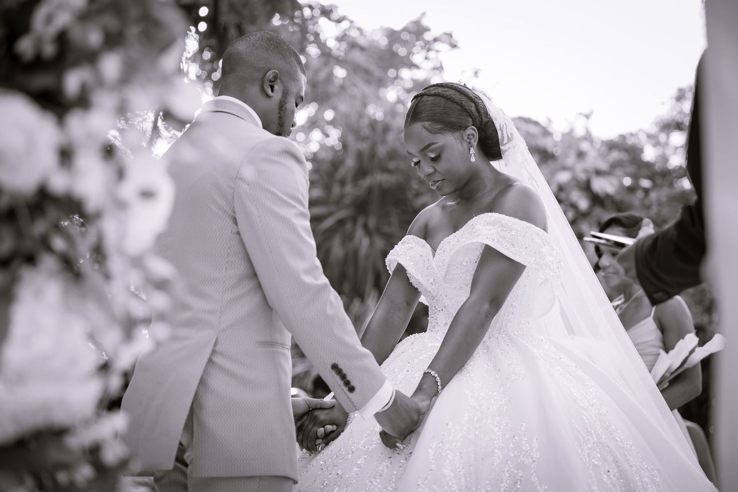 Black and white photo sequence showing a bride and bridesmaids getting ready.