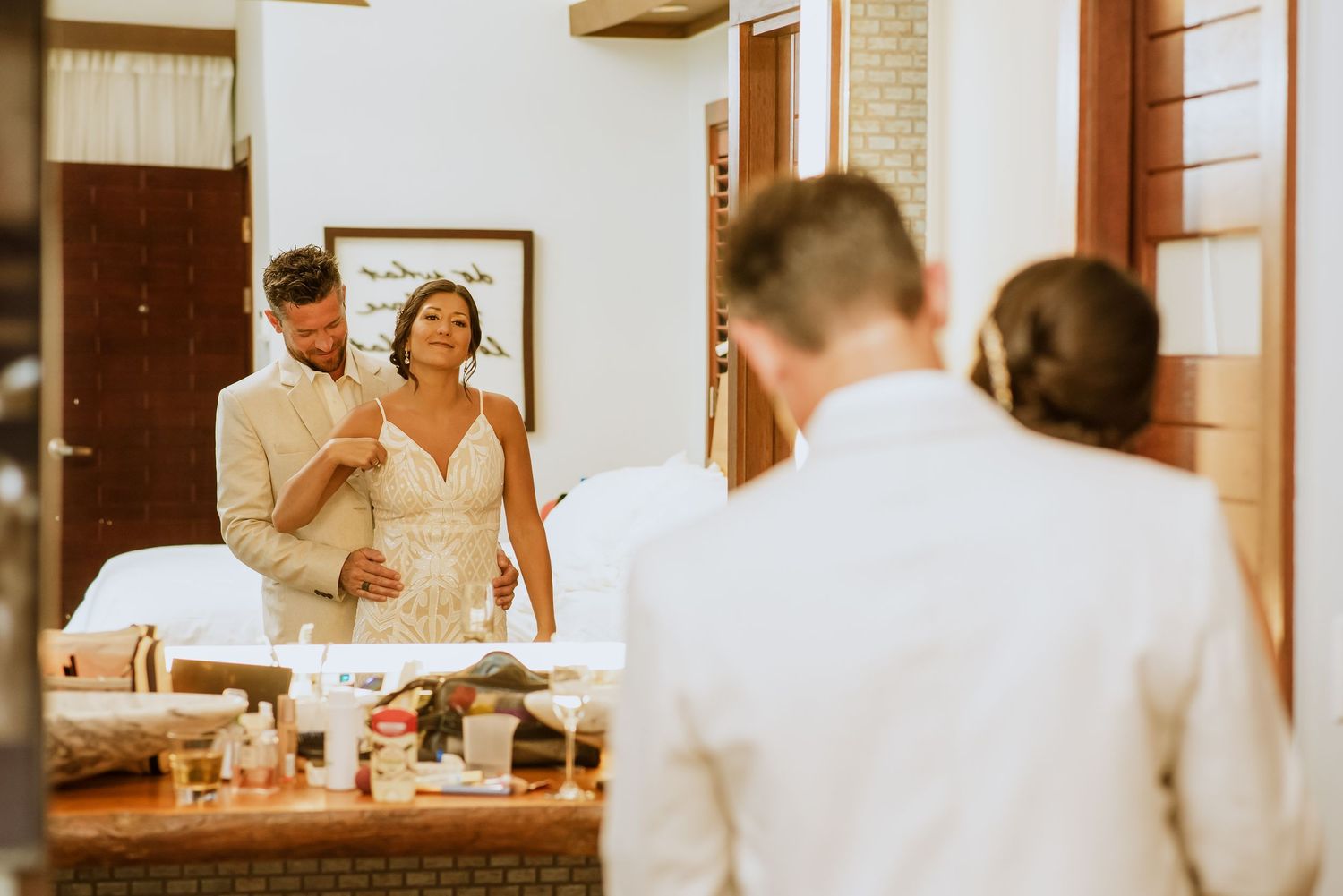 Candid wedding morning moments captured in warm, vintage-style photography.