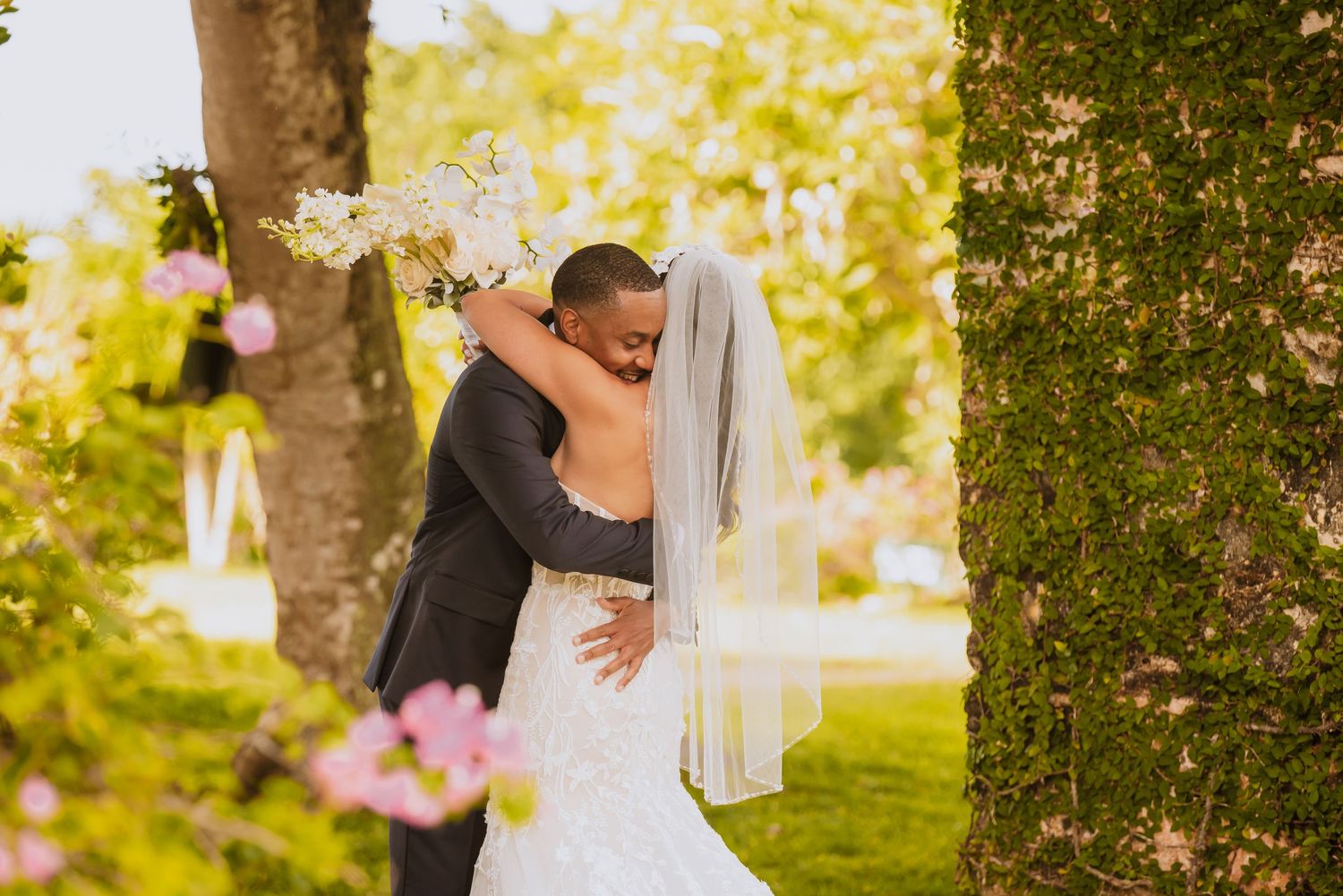 Wedding couple sharing intimate moment during outdoor first look photoshoot.