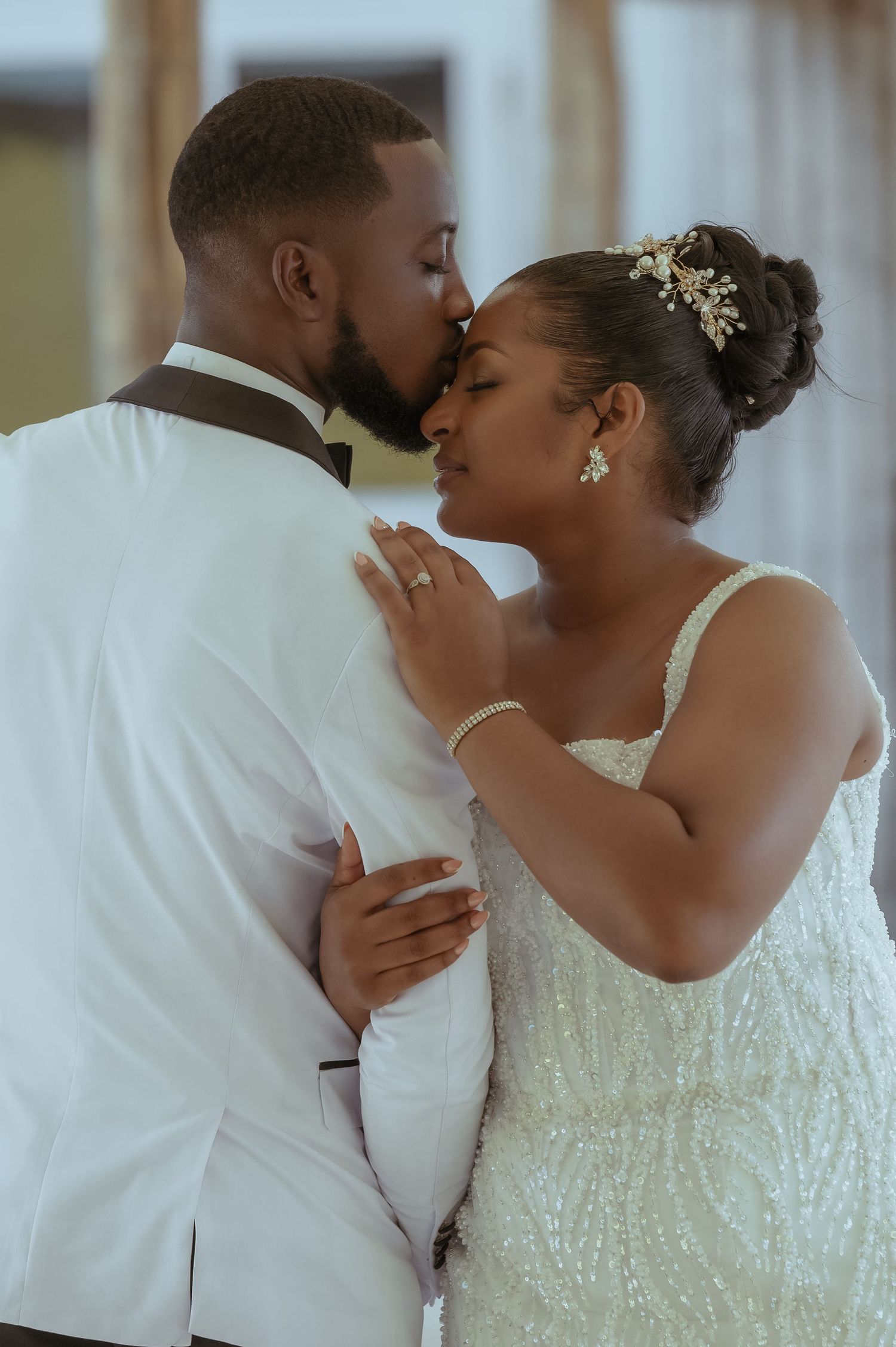 Romantic wedding couple sharing intimate kisses in a series of candid moments.