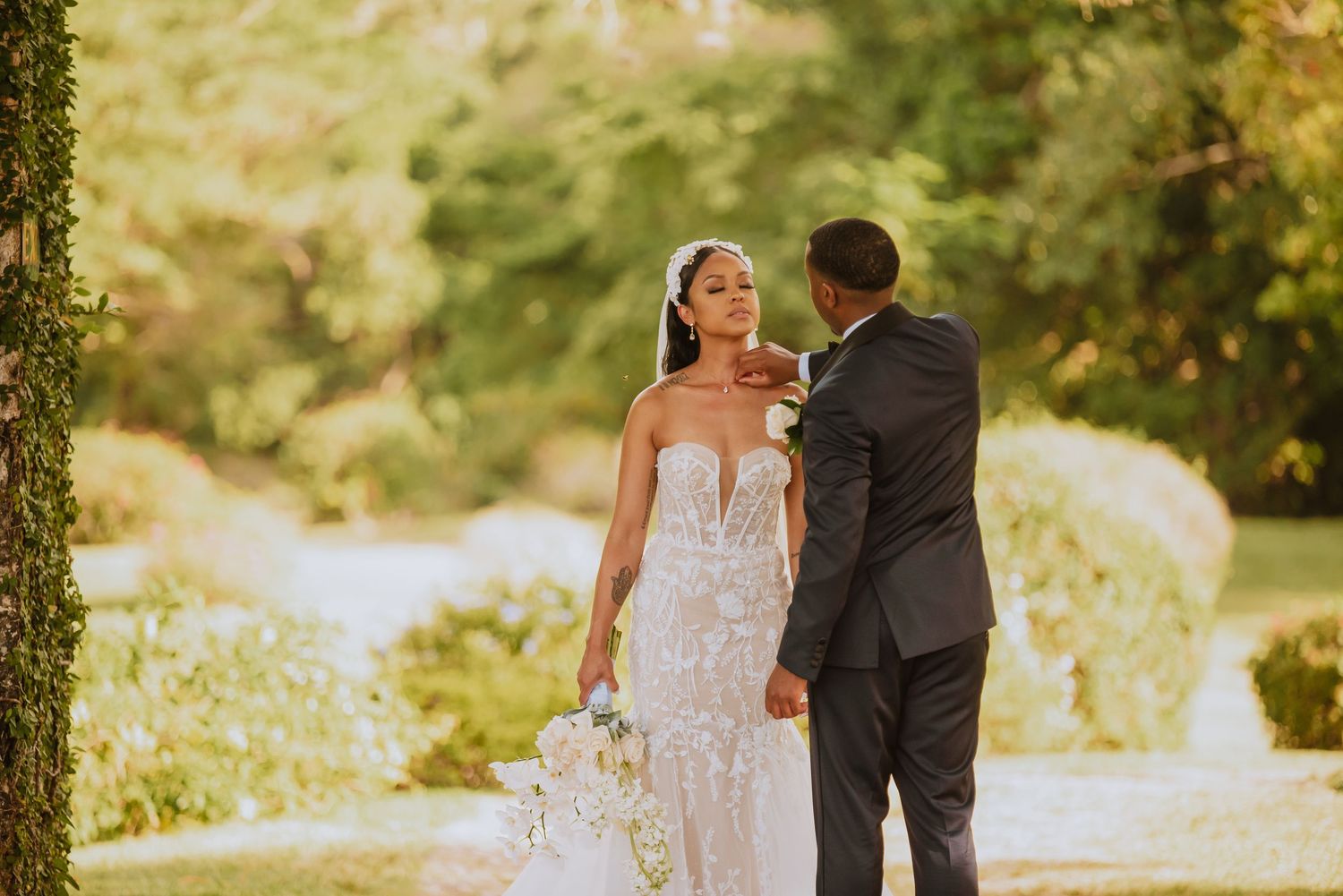 A golden hour wedding photoshoot in a lush garden setting.