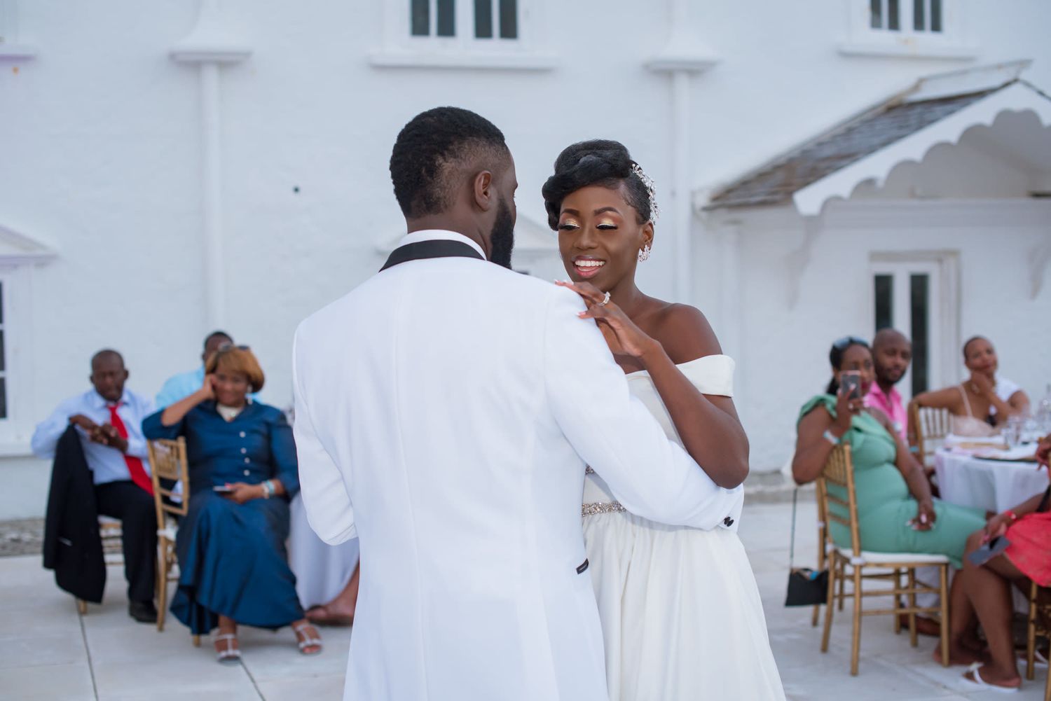 Romantic wedding couple shares intimate moments in a series of black and white photographs.