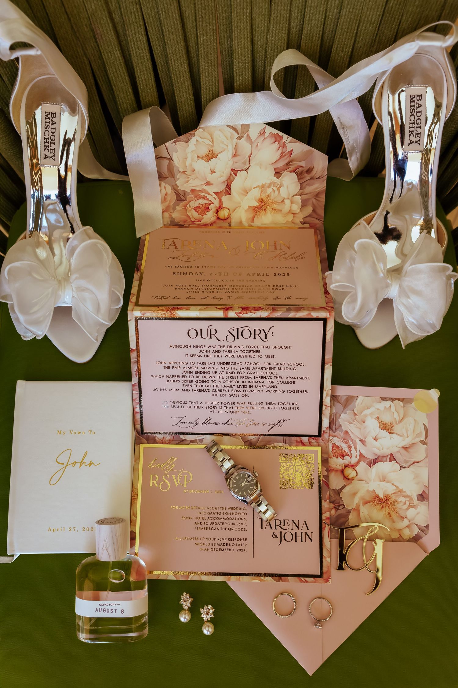 Wedding invitation suite with floral designs, RSVP cards, and white shoes arranged on a green background.