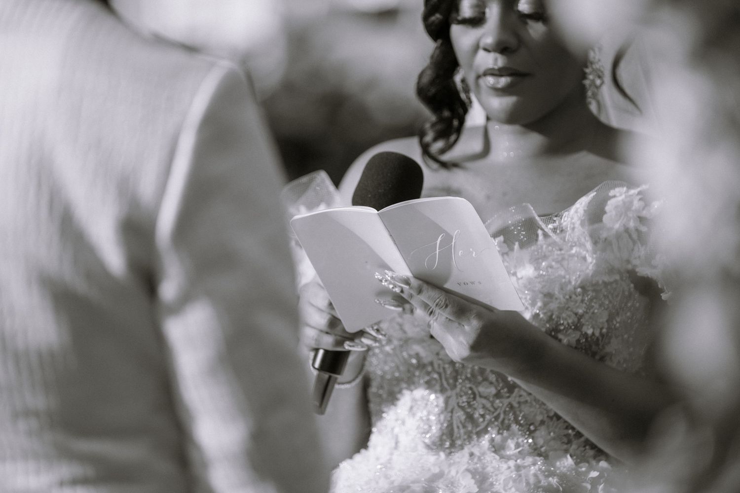 Intimate black and white portraits capturing candid moments during wedding preparations.