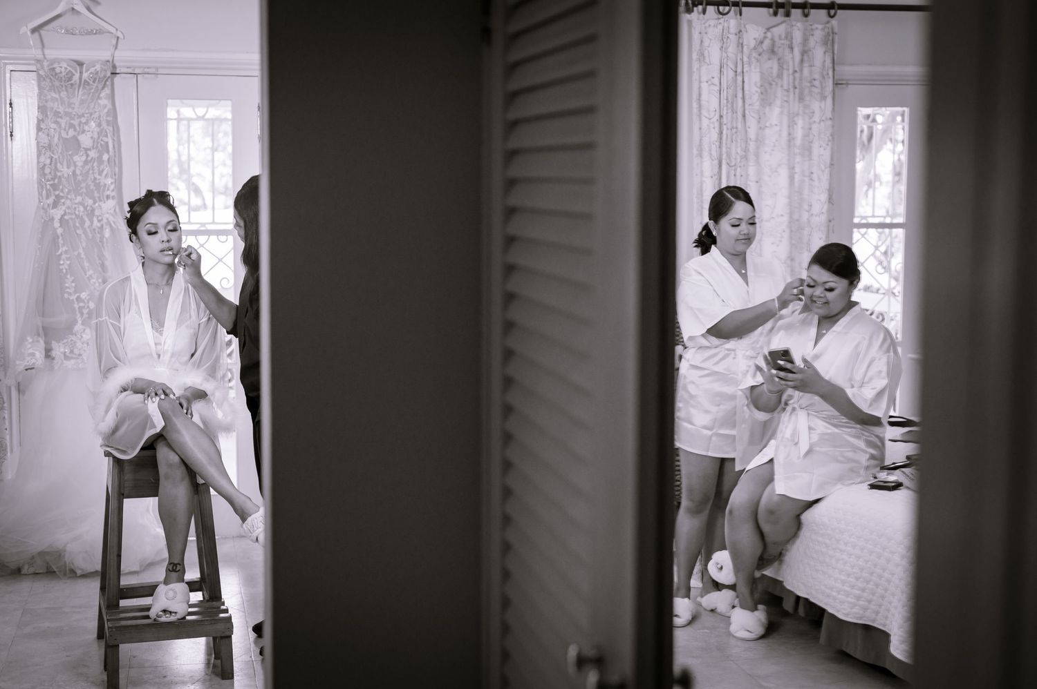 Black and white artistic wedding preparation photos in a vintage style.