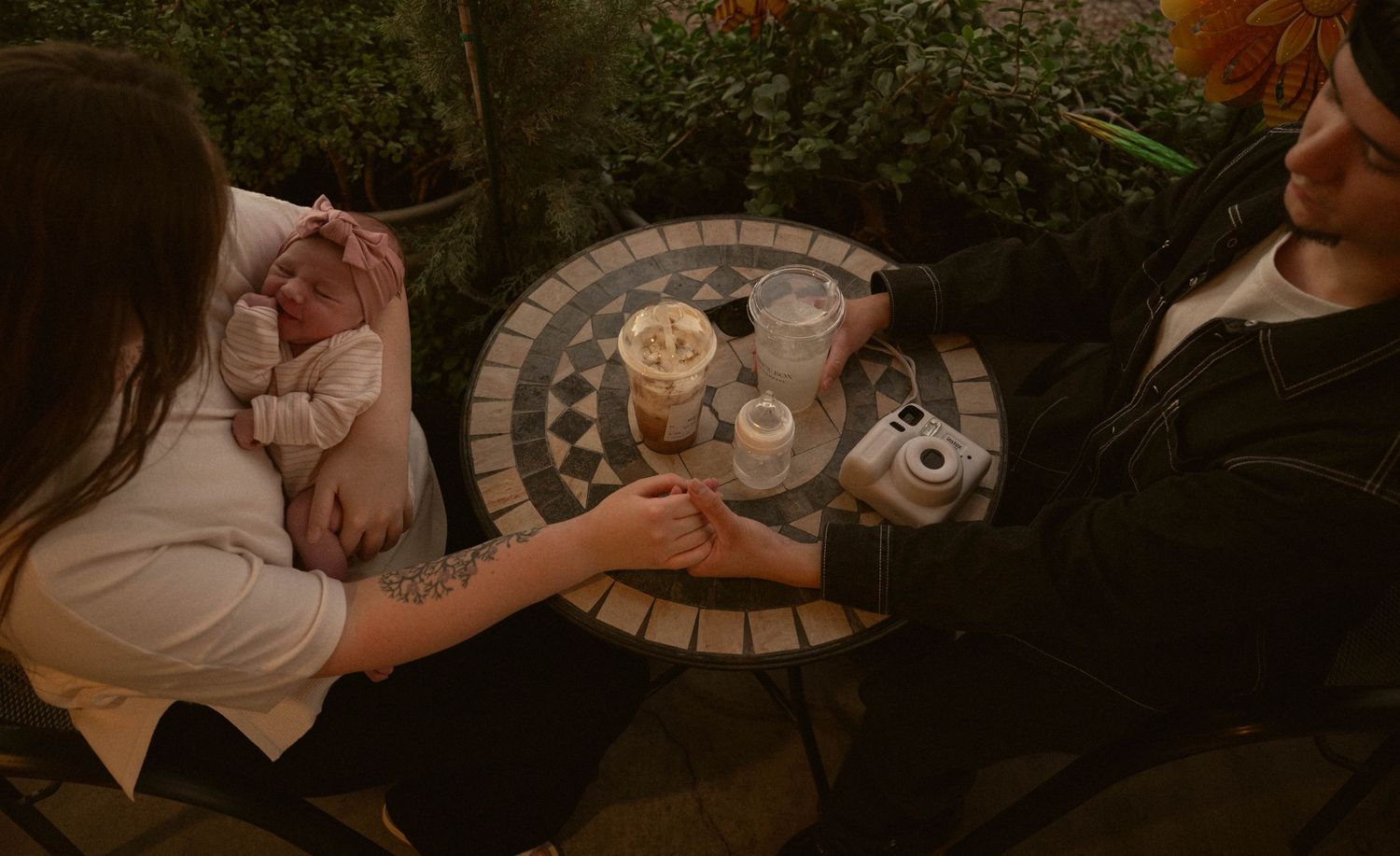 A series of dimly lit vintage-style photos showing hands holding teacups and coffee cups in cozy settings.