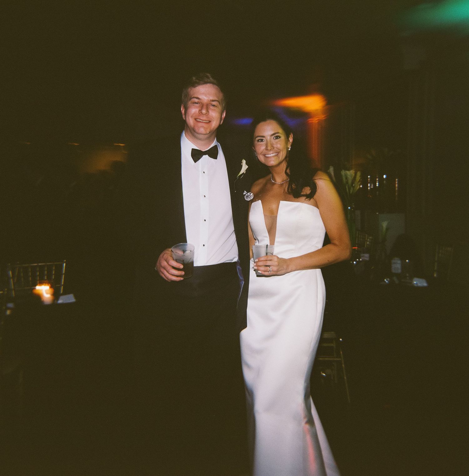 Elegant evening reception portrait in formal black tie attire.