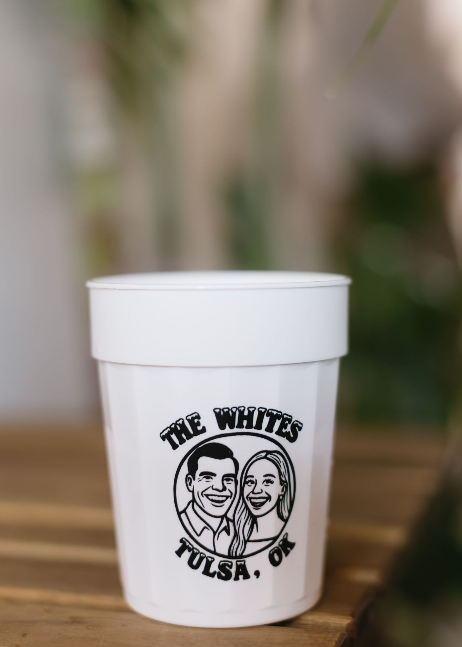 White disposable cups with a retro logo design displayed in a sequence.
