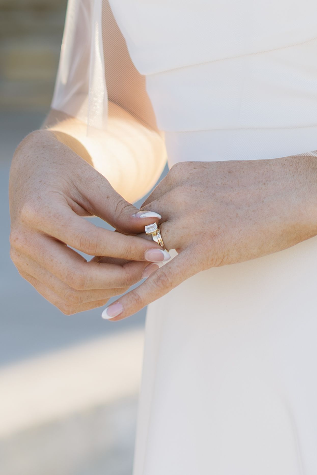 Close-up shots showing a ring being placed on a finger in a sequence.